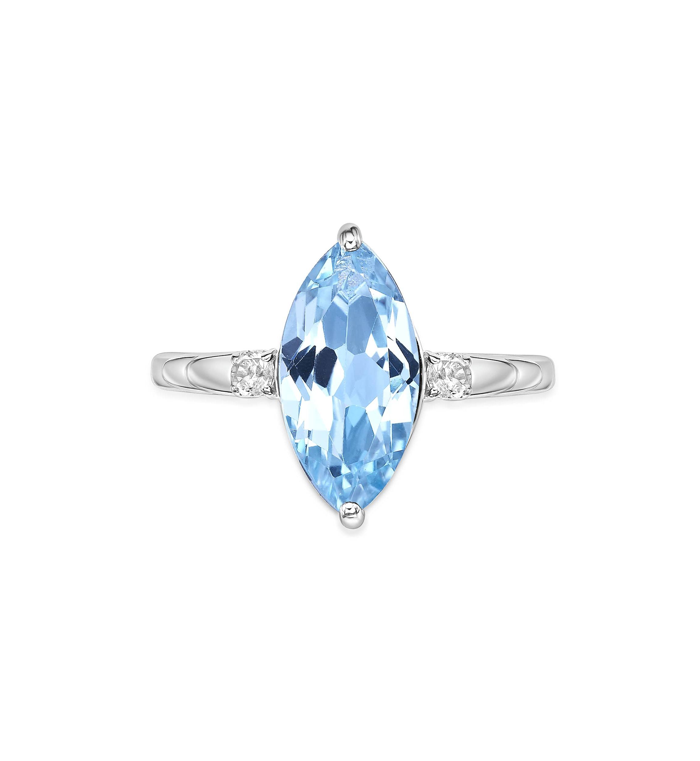 3 1/5 ct. t.w. Blue Topaz and 1/10 Created White Sapphire Ring in Sterling Silver