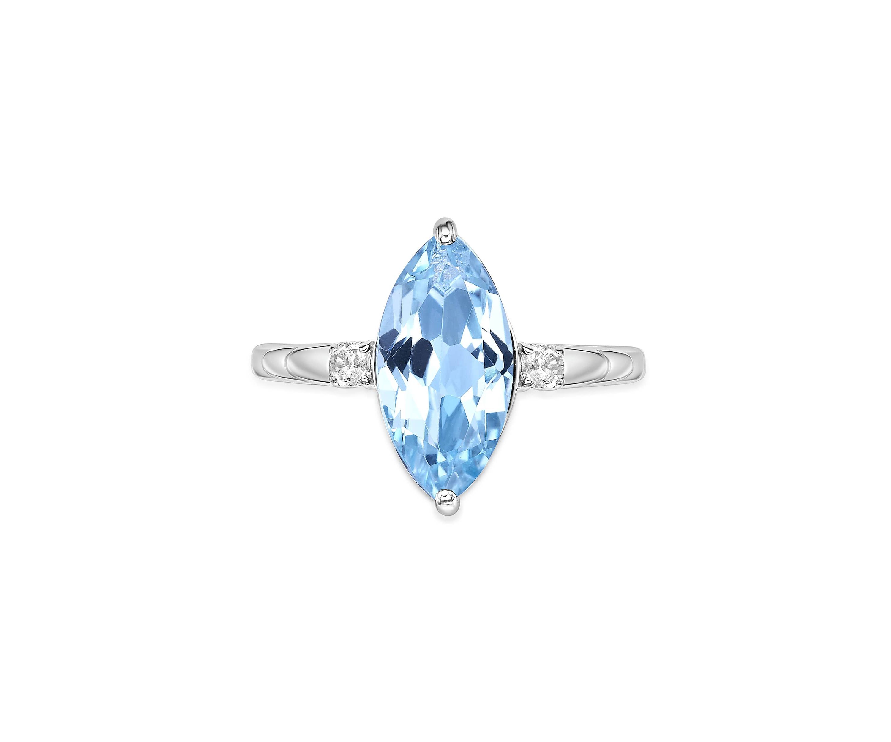 3 1/5 ct. t.w. Blue Topaz and 1/10 Created White Sapphire Ring in Sterling Silver