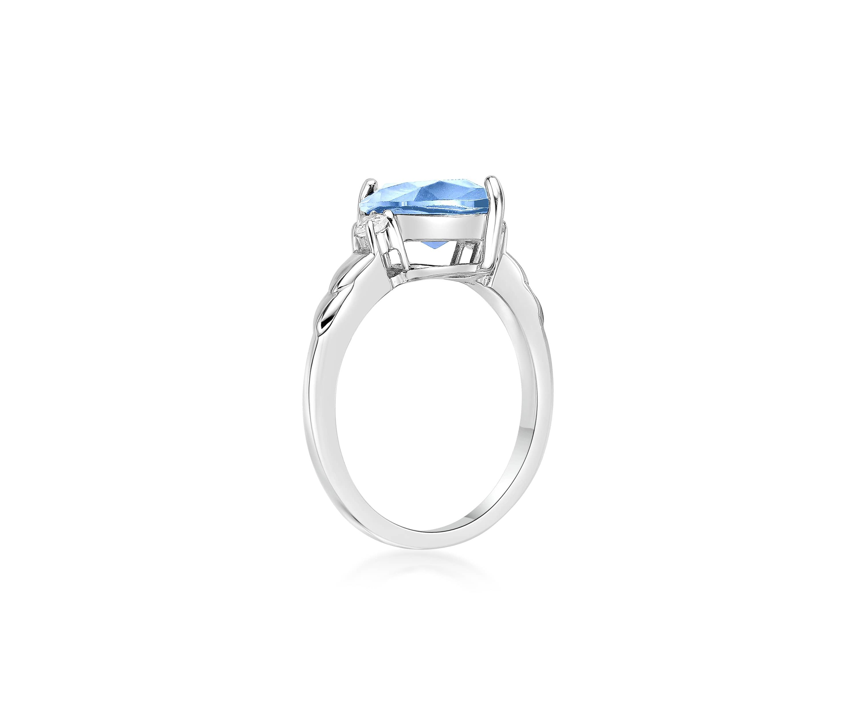 3 1/5 ct. t.w. Blue Topaz and 1/10 Created White Sapphire Ring in Sterling Silver