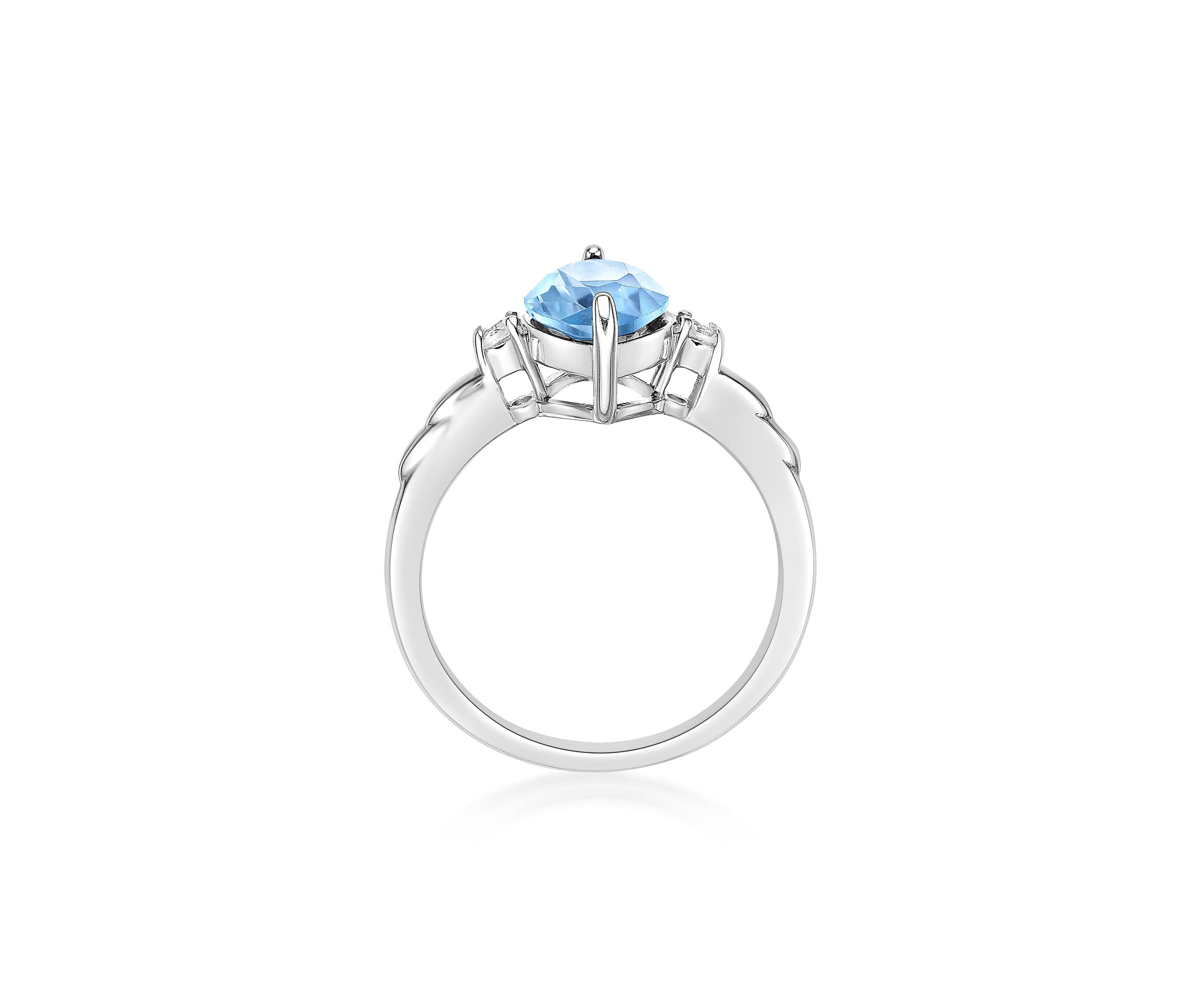3 1/5 ct. t.w. Blue Topaz and 1/10 Created White Sapphire Ring in Sterling Silver