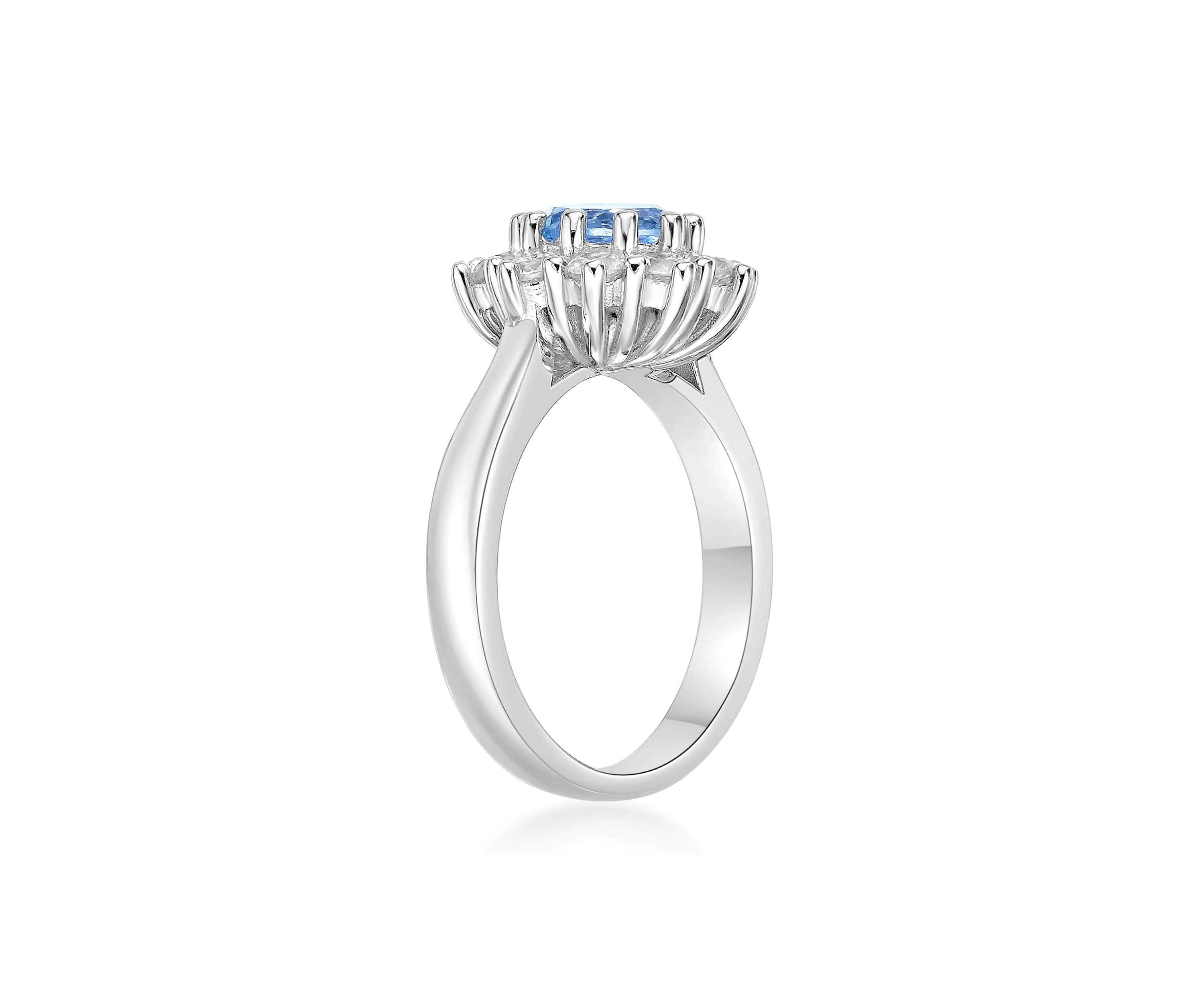 1 1/2 ct. t.w. Blue Topaz and 7/8 ct. t.w. Created White Sapphire Ring in Sterling Silver