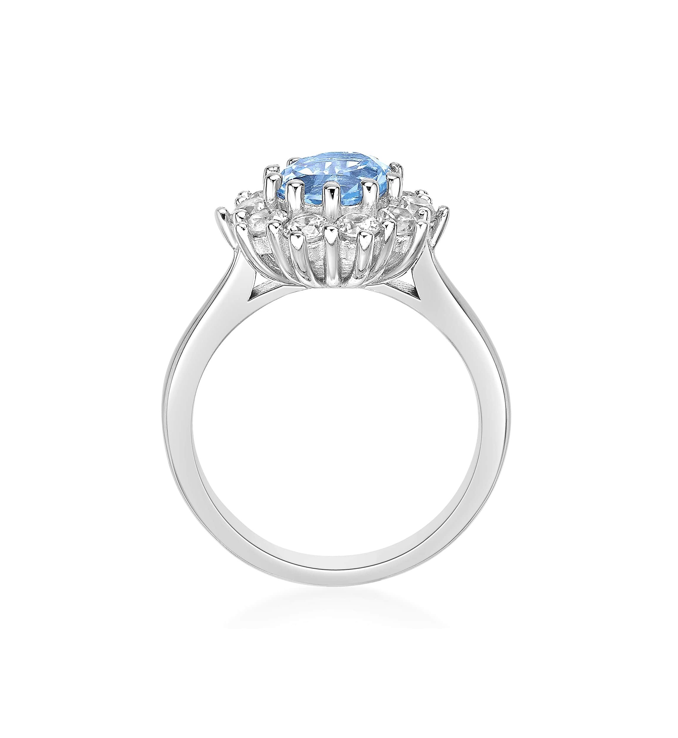 1 1/2 ct. t.w. Blue Topaz and 7/8 ct. t.w. Created White Sapphire Ring in Sterling Silver