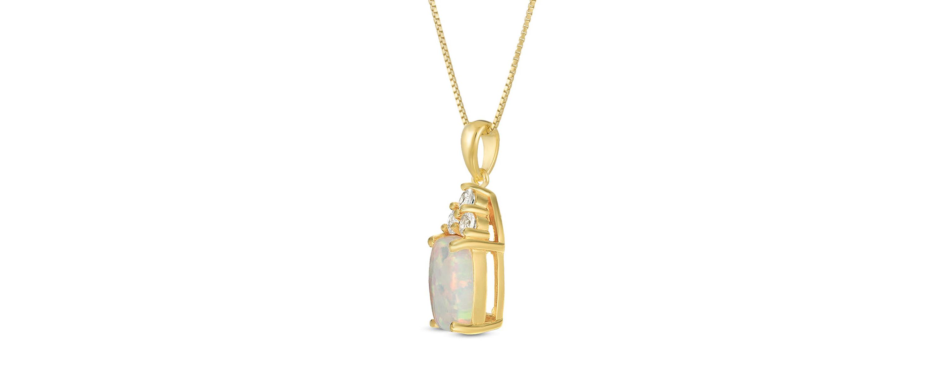 Lab Created 1.2 ct. t.w. Lab-created Opal and 1/8 ct. t.w. White Topaz Pendant Necklace in Gold Plated Sterling Silver