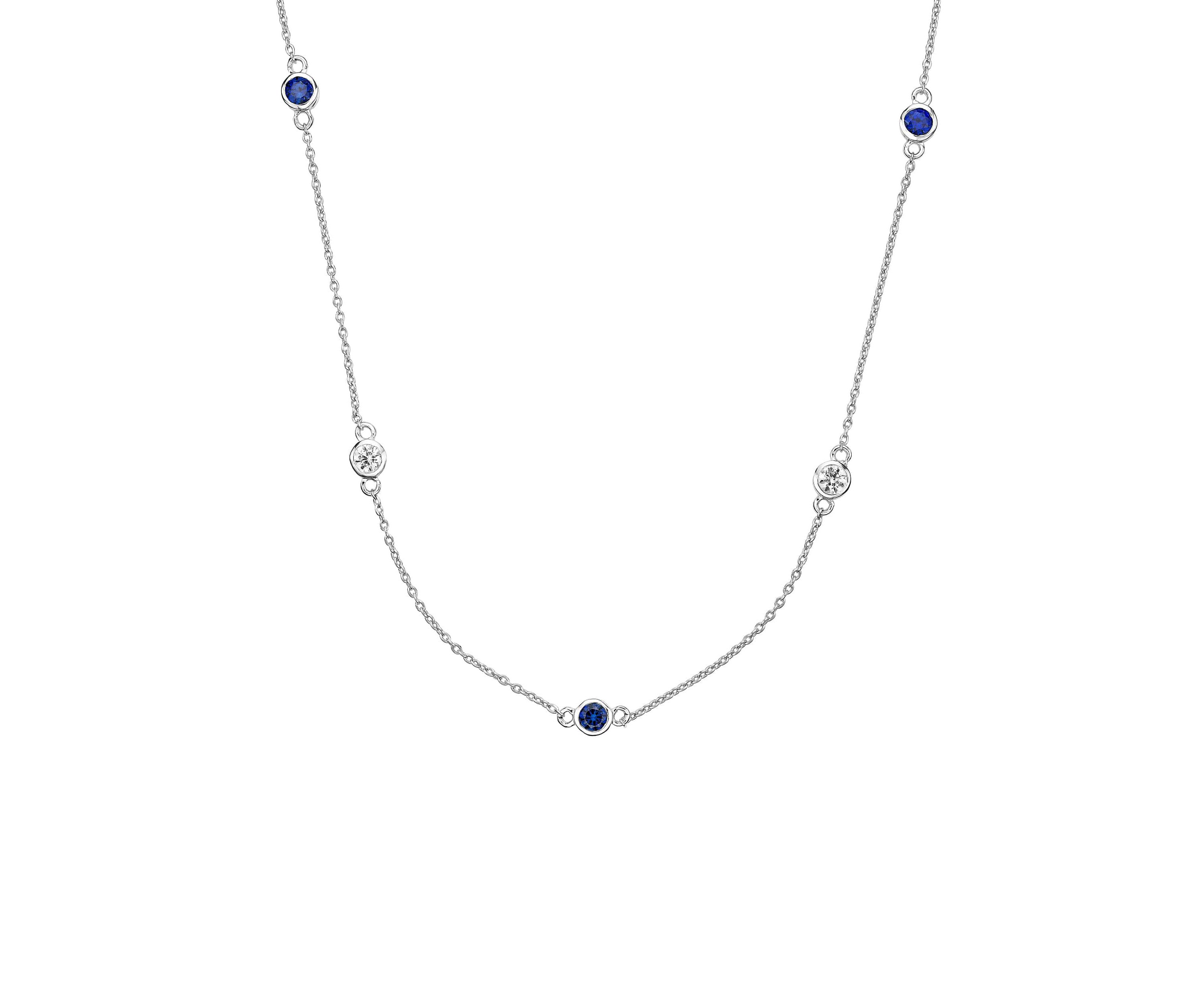 Lab Created 1/2 ct. t.w.Created Sapphire and 1/2 ct. t.w. White Topaz Pendant Necklace in Sterling Silver