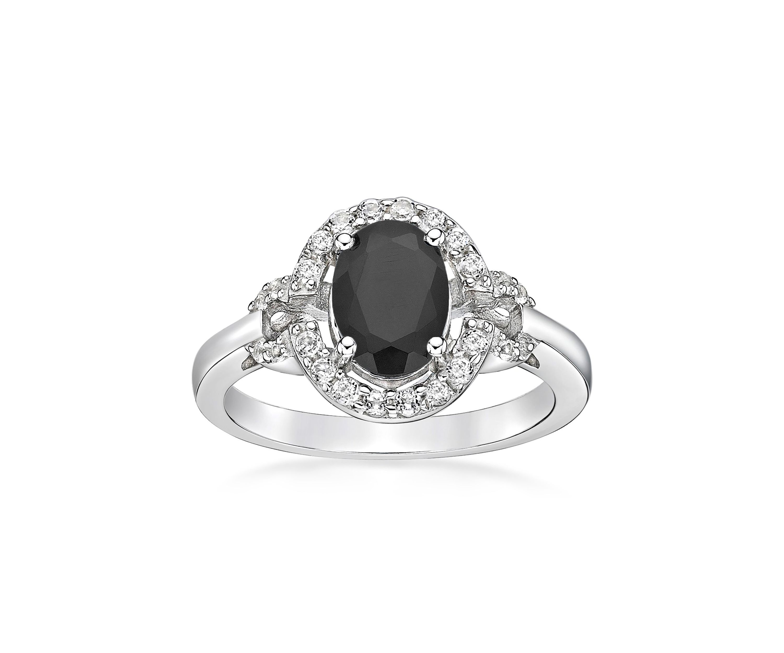 1. 15 ct. t.w. Black Onyx and 1/2 ct. t.w. White Topaz Ring in Sterling Silver