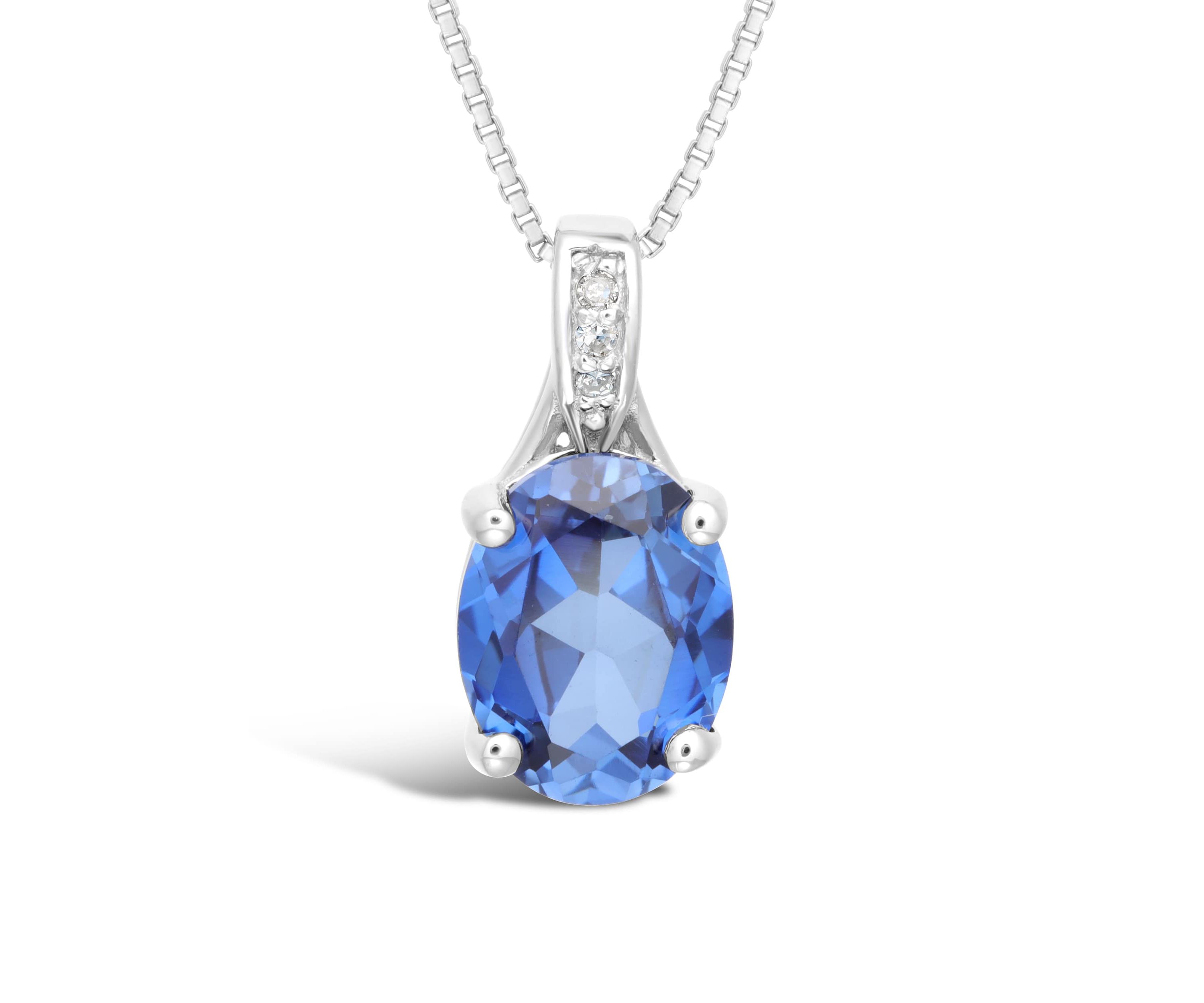 Lab Created 2 1/10 ct. t.w. Created Sapphire and Diamond Accent Pendant in Sterling Silver