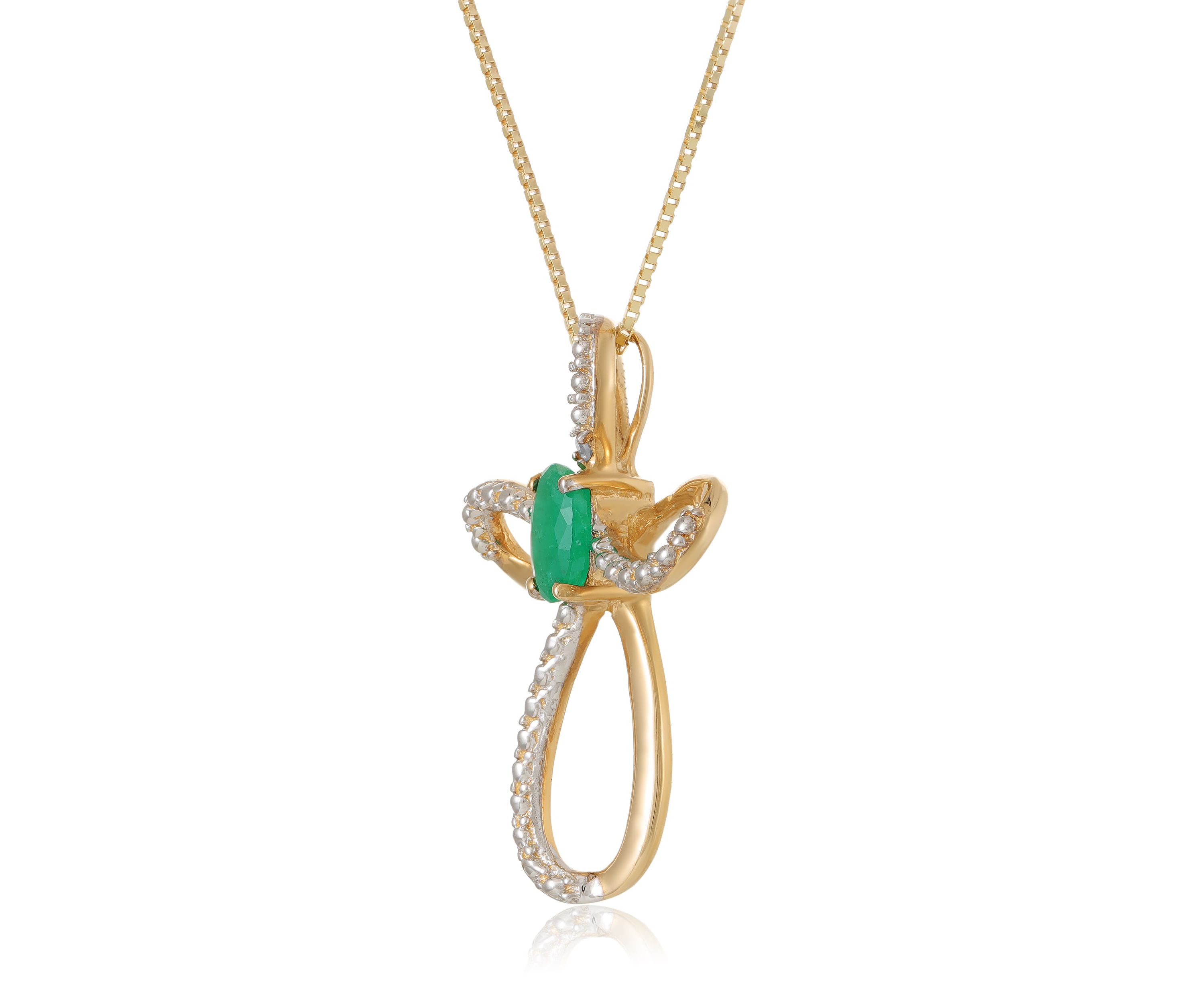 1/3 ct. t.w. Emerald and Diamond Accent Cross Pendant in 10K Gold