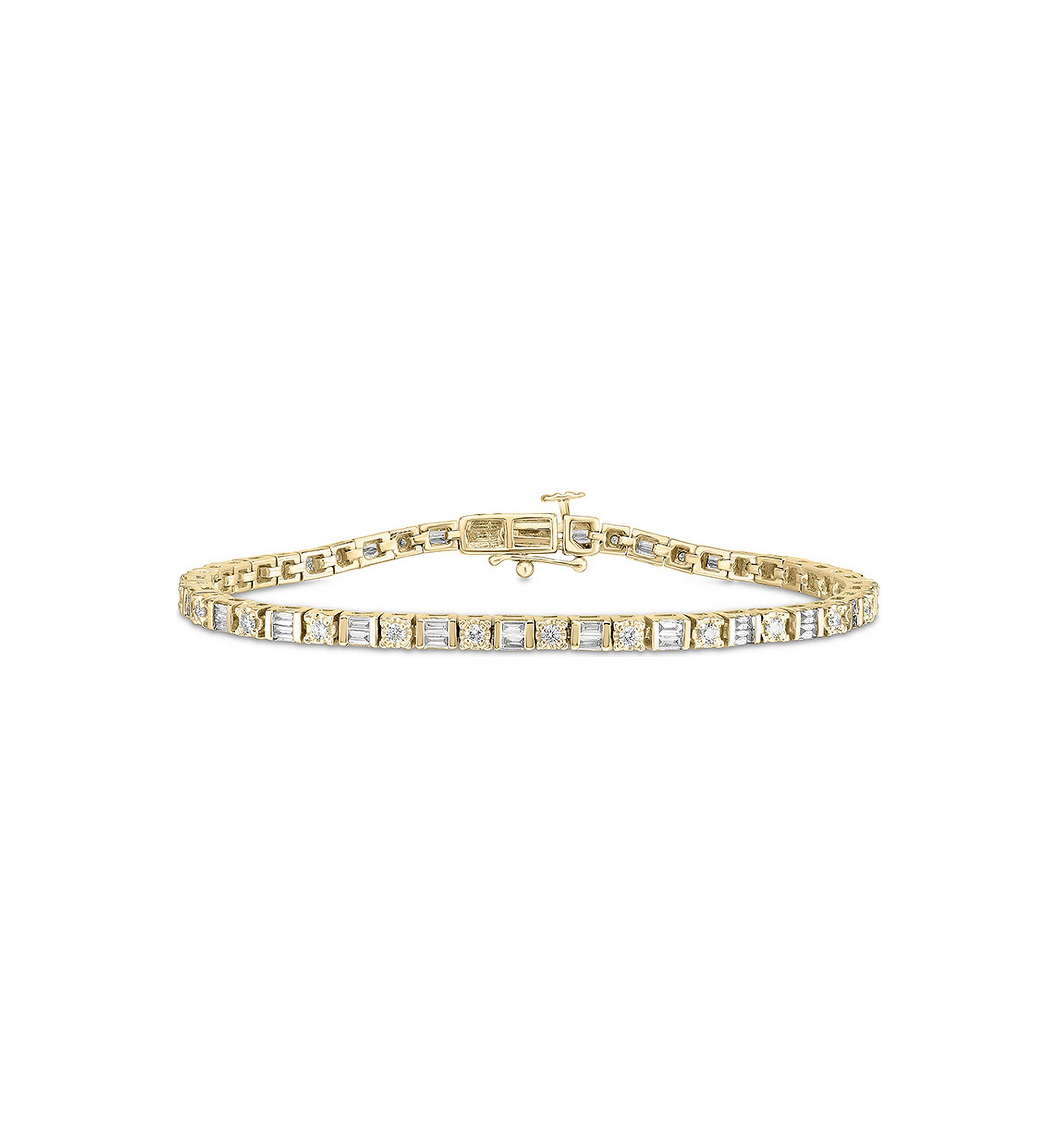 1/2 ct. t.w. Baguette and Round Diamond Tennis Bracelet in 10K Gold (I/I2)