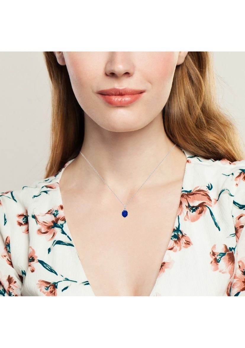 Sterling Silver Created Blue Sapphire Oval Pendant Necklace with White Topaz Sunburst Halo 9mm x 7mm with 18 Inch Cable Chain