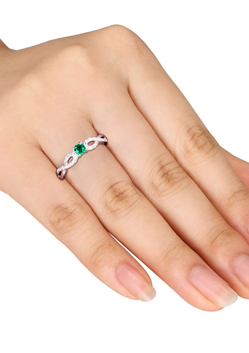 1/10 ct. t.w. Created Emerald and 1/10 ct. t.w. Diamond Infinity Engagement Ring in Sterling Silver