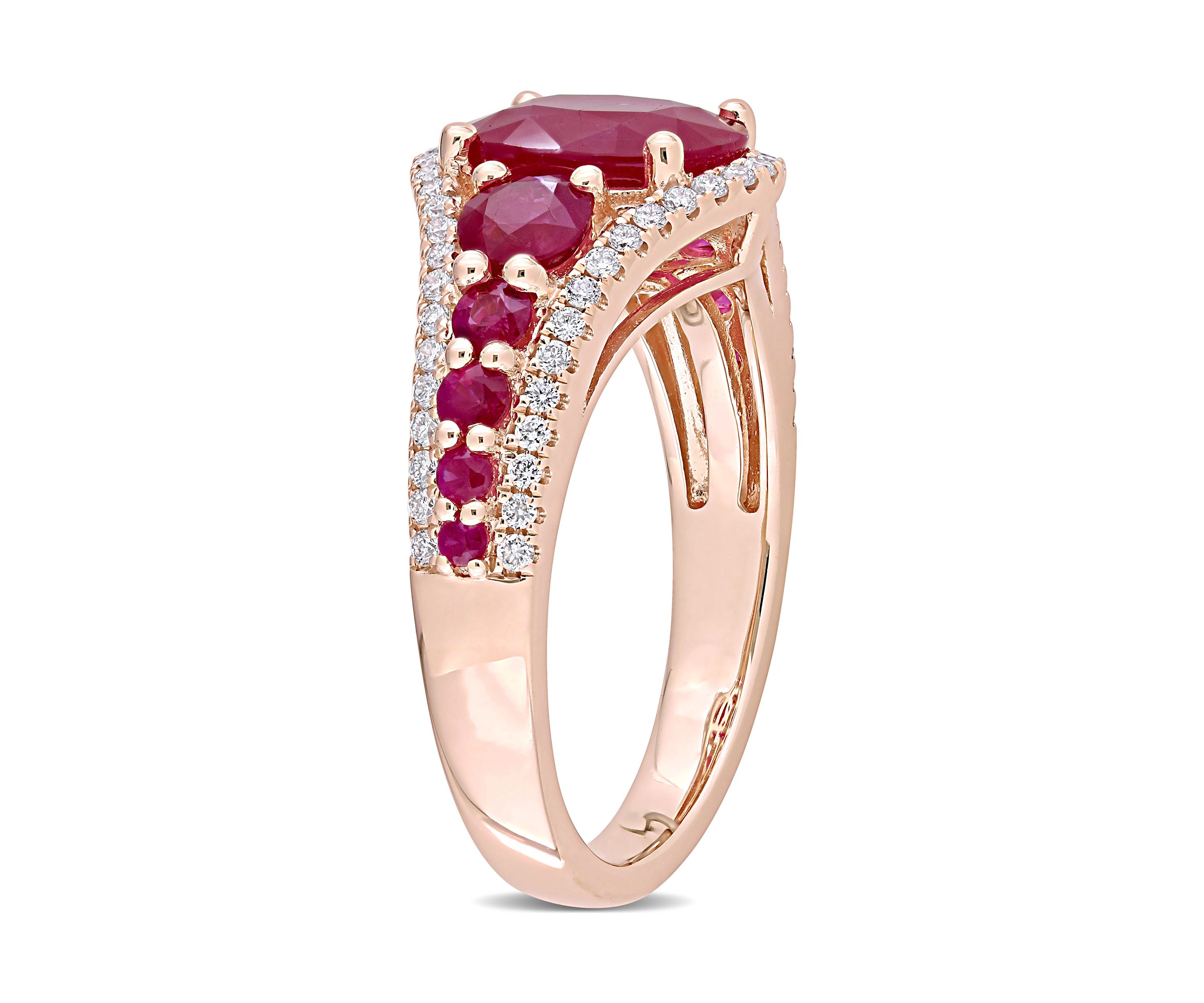 3.4 ct. t.w. Ruby and 1/3 ct. t.w. Diamond Graduated Ring in 14k Rose Gold