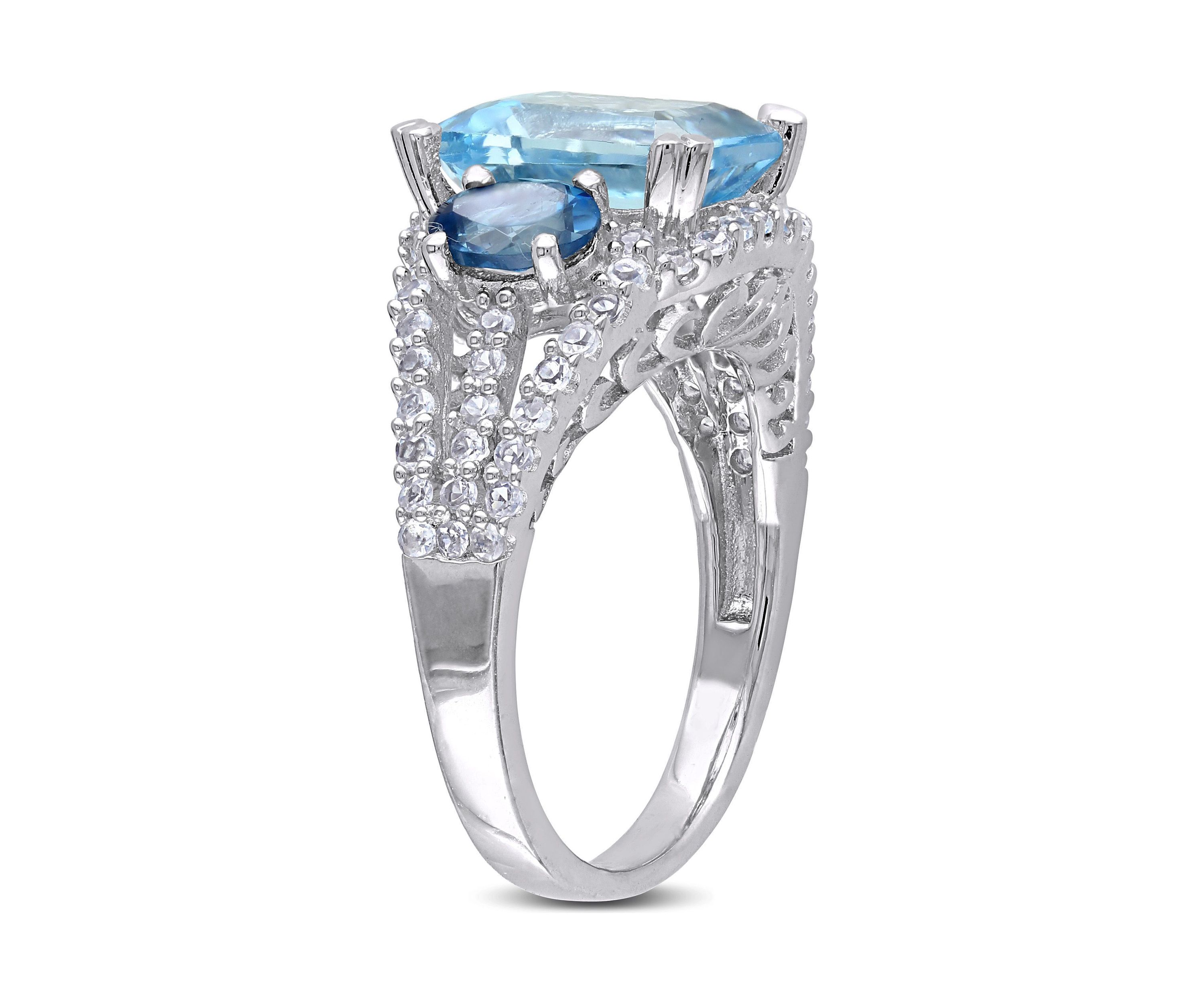 5 3/4 CT TGW Emerald Cut Sky Blue Topaz and Created White Sapphire 3-Stone Ring in Sterling Silver