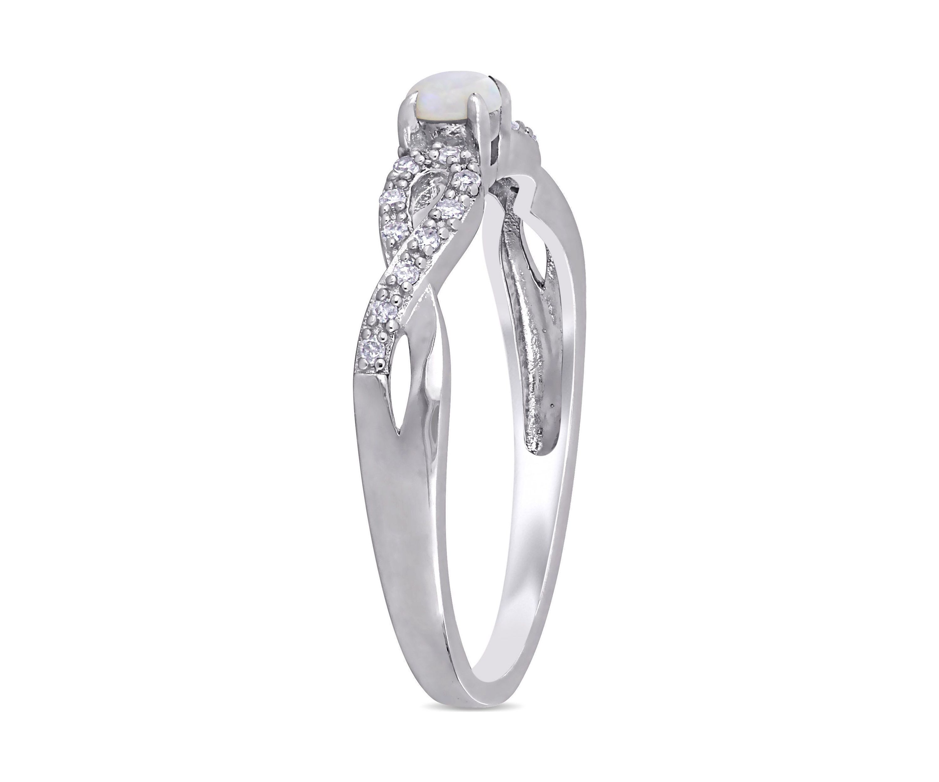 1/10 CT TW Diamond and Opal Infinity Ring in Sterling Silver