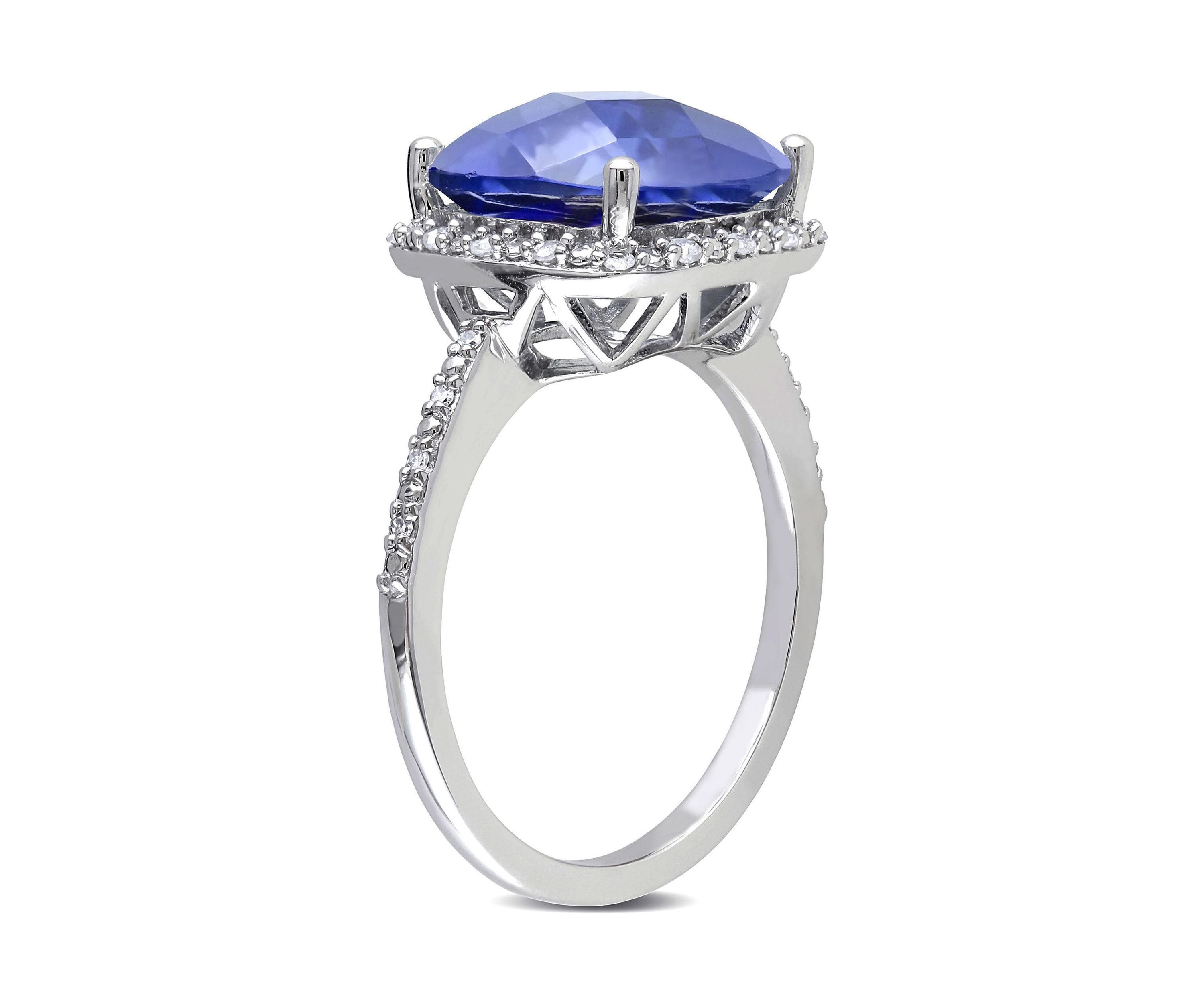 Lab Created 1/10 CT TW Diamond and 5 3/4 CT TGW Cushion Cut Created Blue Sapphire Halo Ring in Sterling Silver