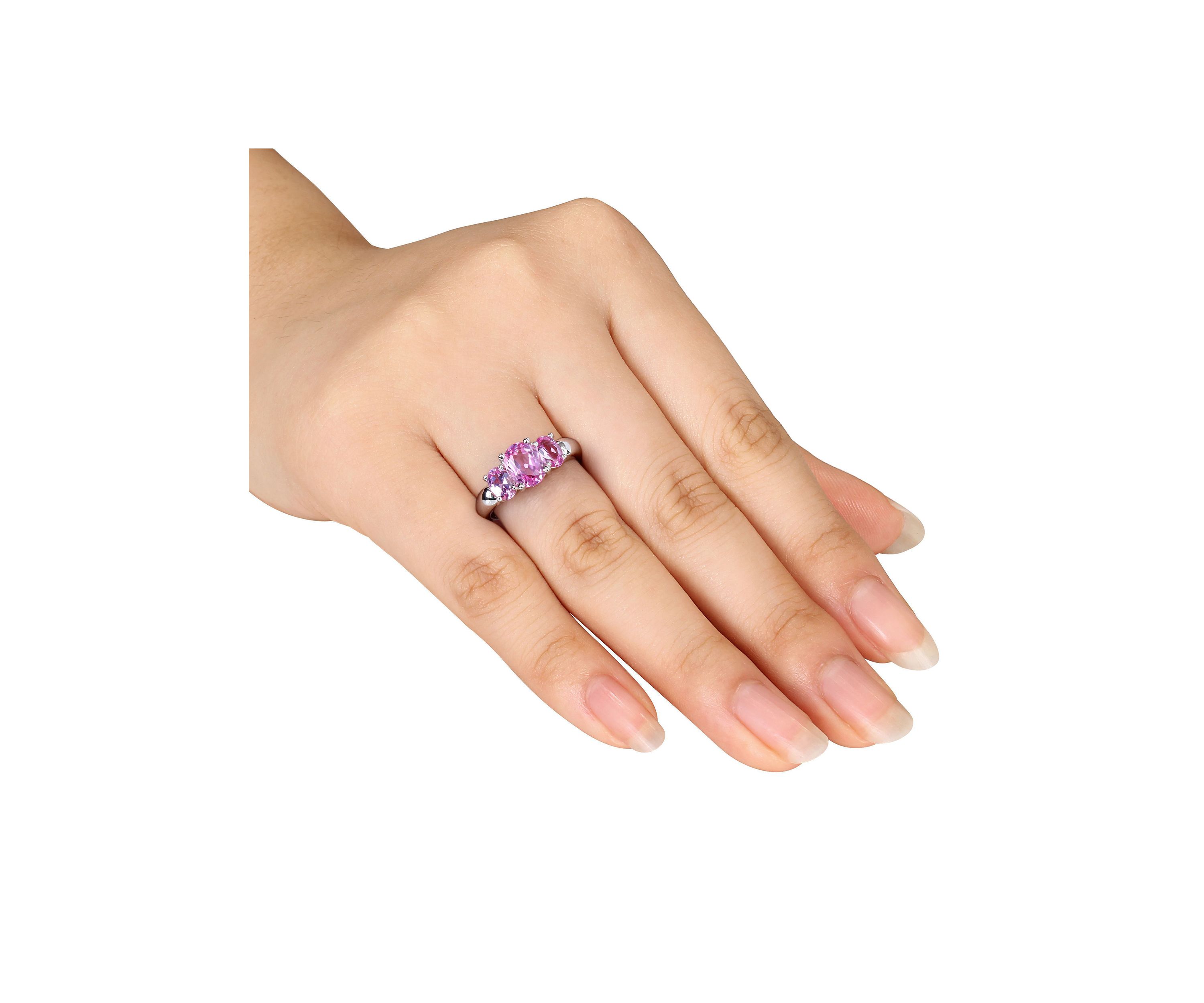 Lab Created 3 1/6 CT TGW Oval Cut Created Pink Sapphire 3-Stone Ring in Sterling Silver