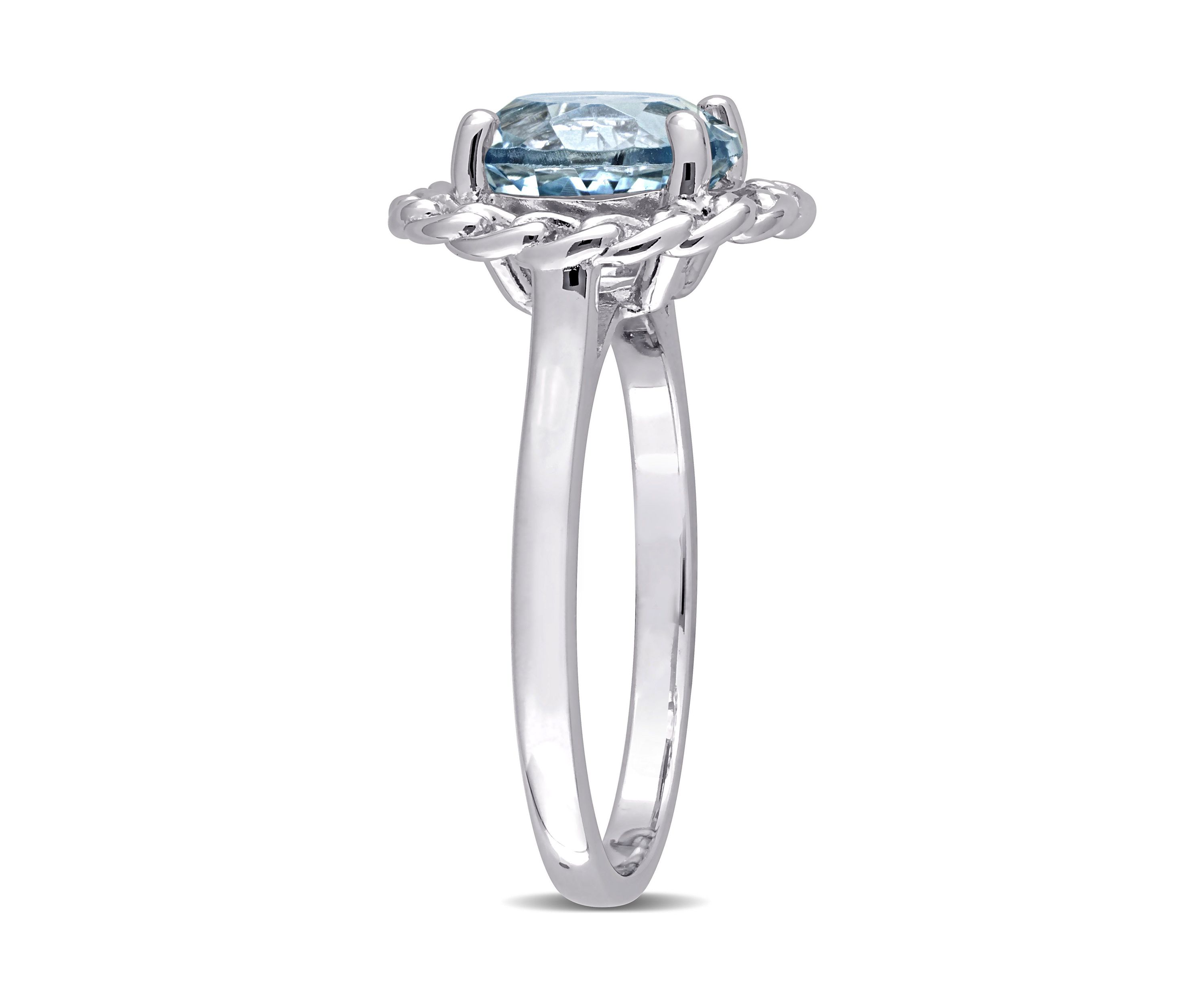 3 1/2 CT TGW Sky Blue Topaz Halo Ring in Sterling Silver