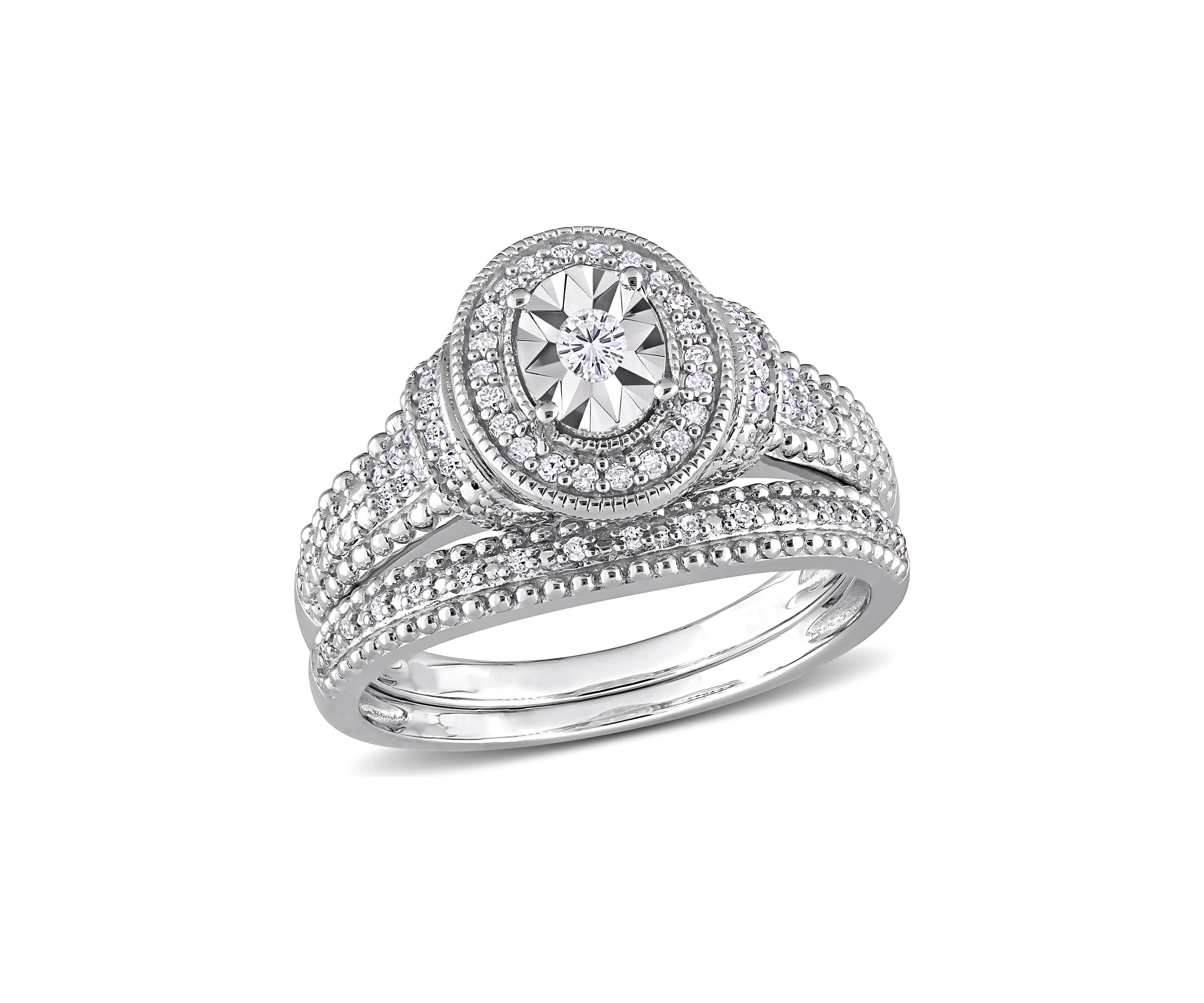 1/4 CT TW Diamond Oval Bridal Ring Set in Sterling Silver