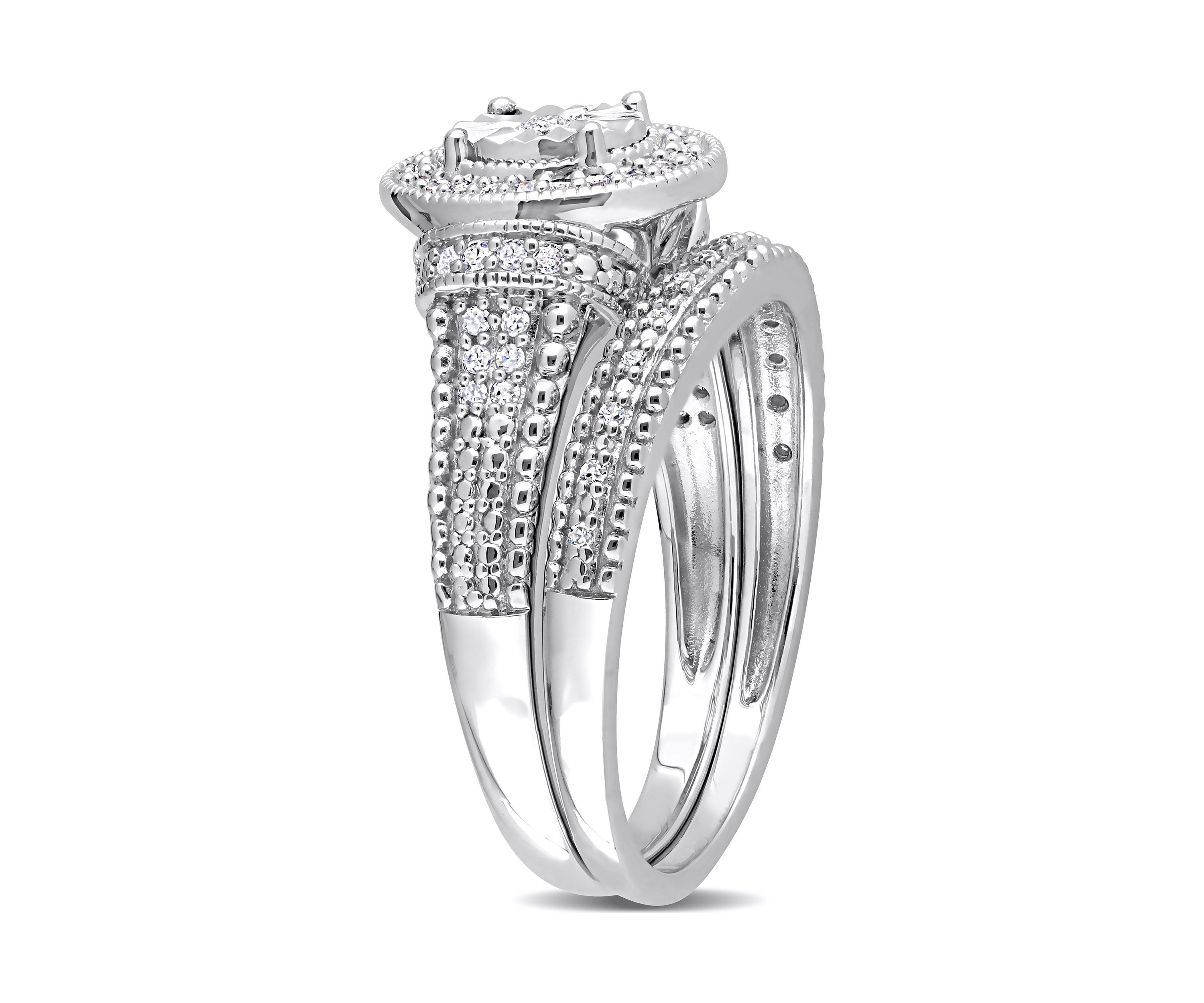 1/4 CT TW Diamond Oval Bridal Ring Set in Sterling Silver