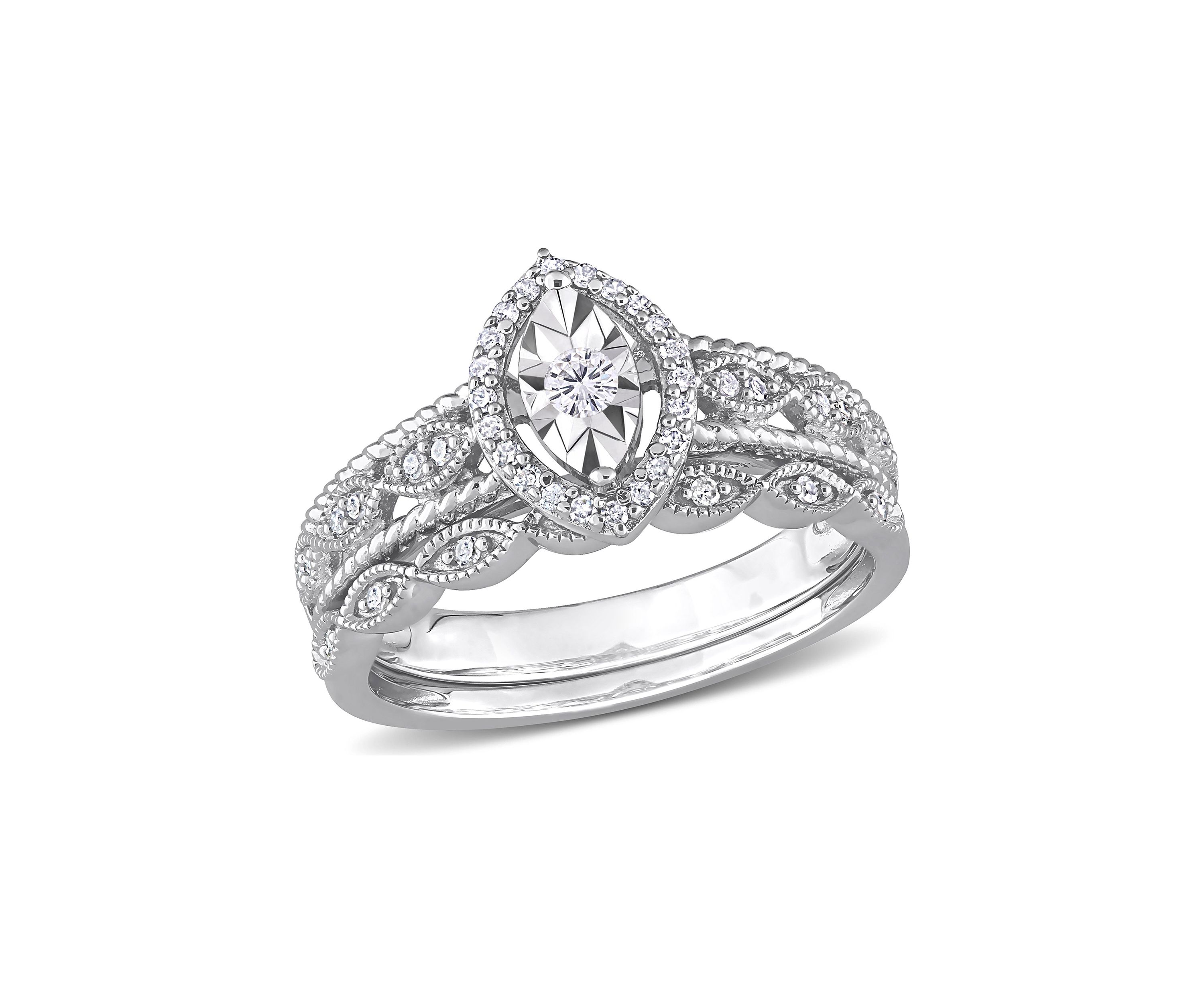 1/5 CT TW Diamond Oval Halo Bridal Ring Set in Sterling Silver