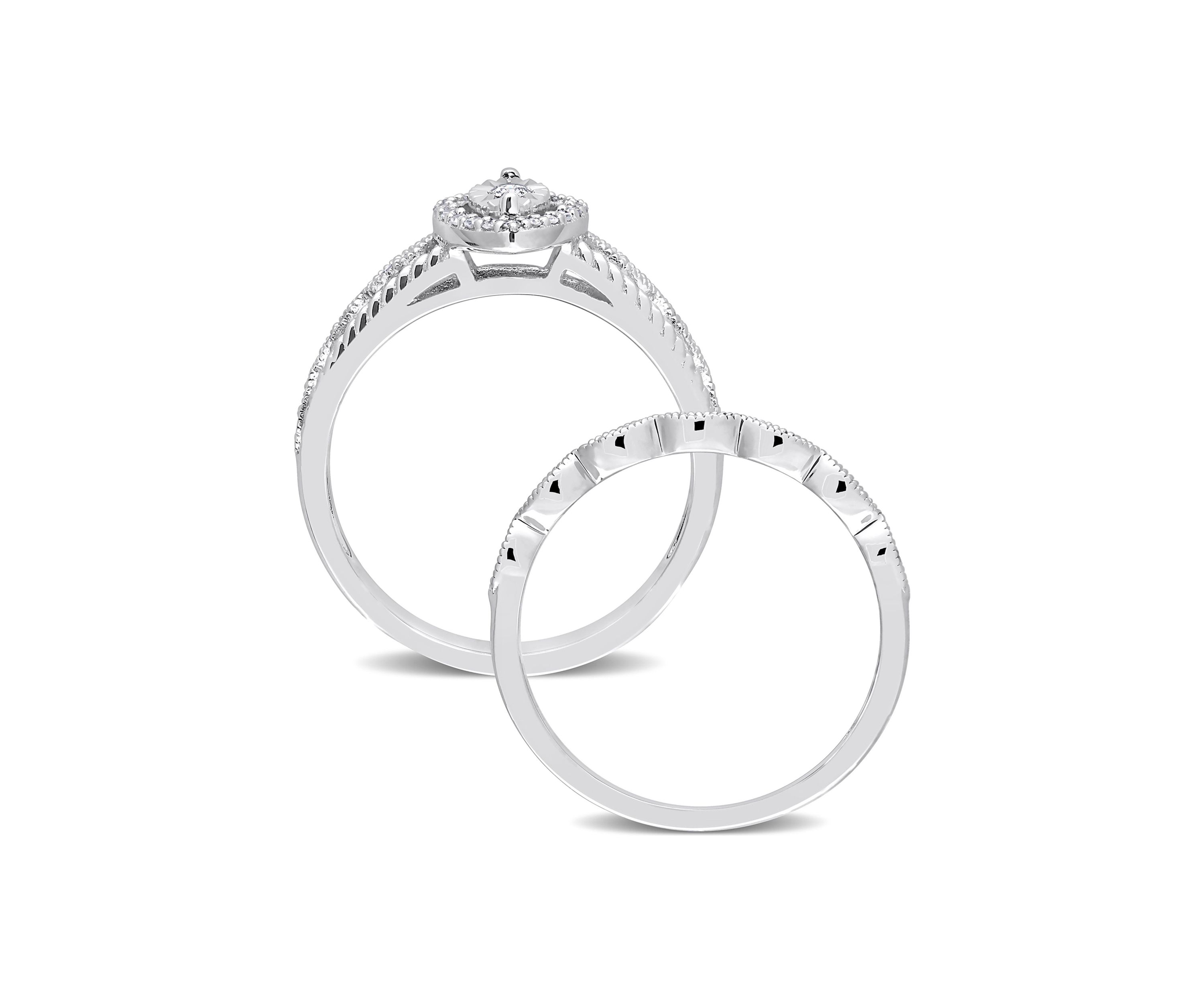 1/5 CT TW Diamond Oval Halo Bridal Ring Set in Sterling Silver