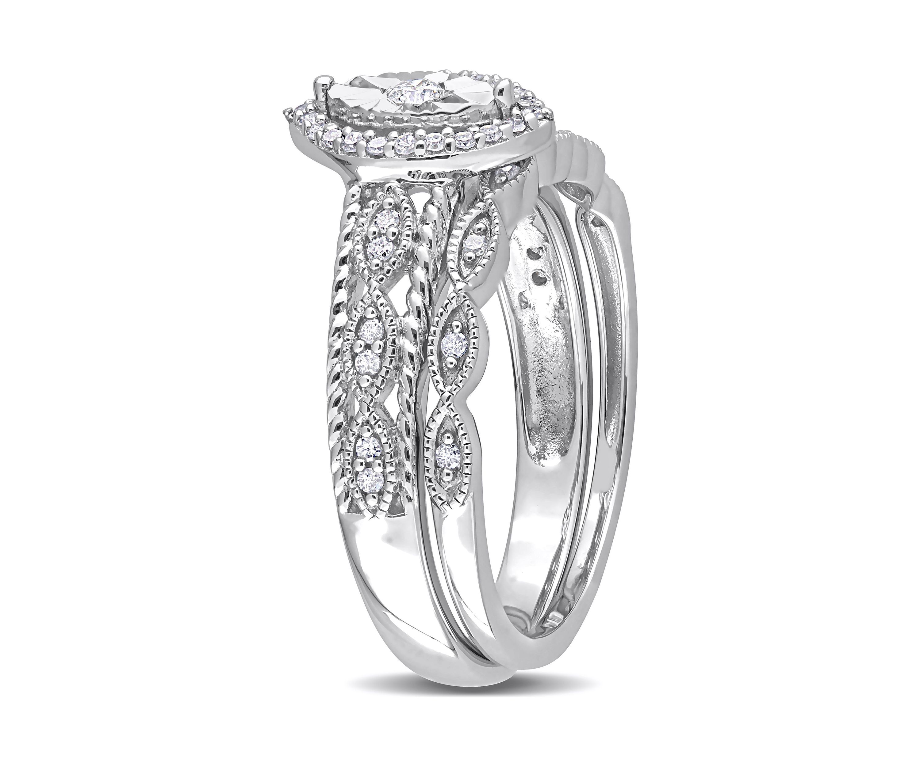 1/5 CT TW Diamond Oval Halo Bridal Ring Set in Sterling Silver