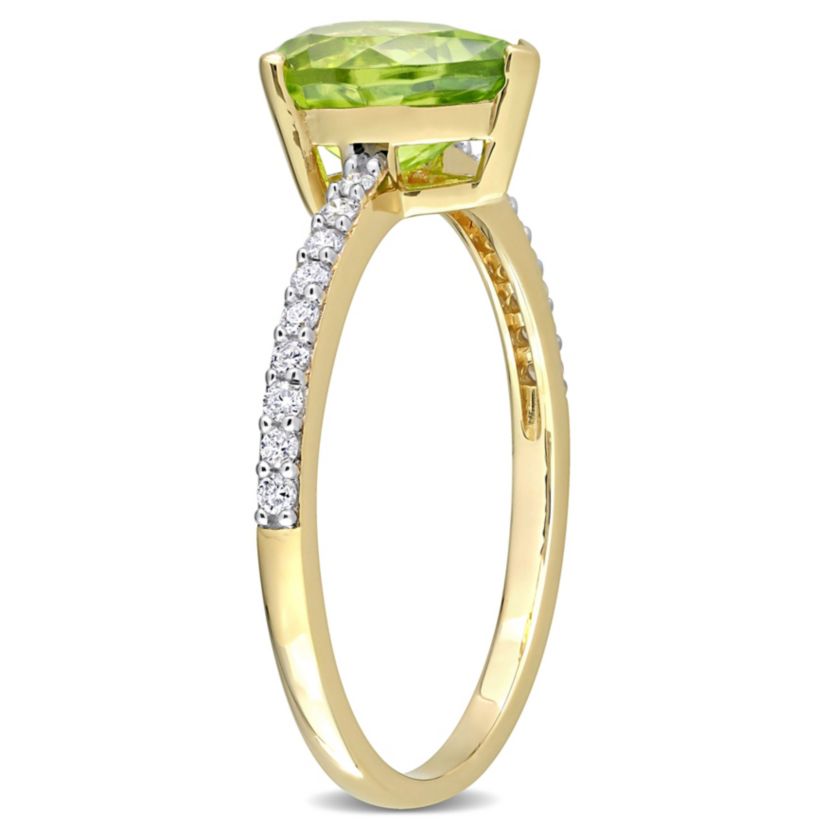 Pear Shape Peridot and 1/7 CT TW Diamond Ring in 14k Yellow Gold