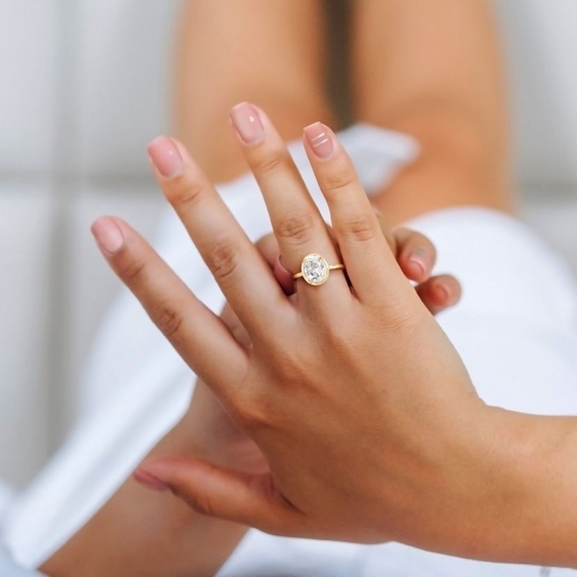 Lab Created 2 CT DEW Oval-Shaped Created Moissanite Engagement Ring in 10k Yellow Gold