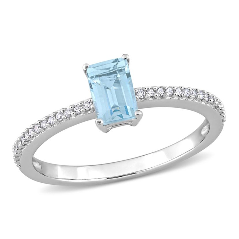 Octagonal Sky Blue Topaz and 1/10 CT TW Diamond Promise Ring in 10k White Gold