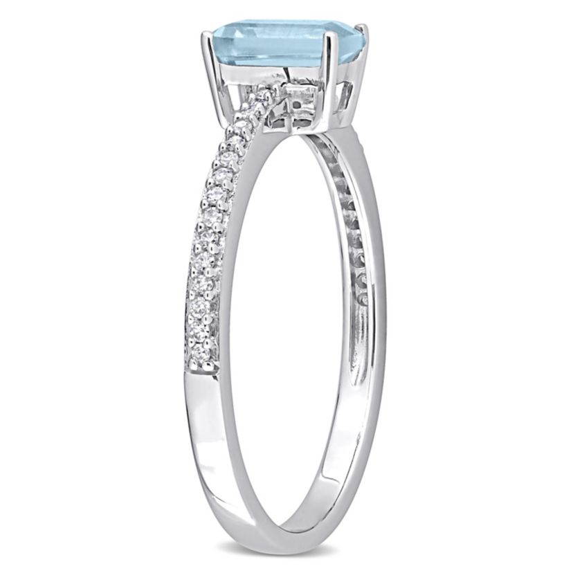 Octagonal Sky Blue Topaz and 1/10 CT TW Diamond Promise Ring in 10k White Gold