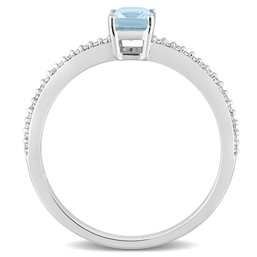 Octagonal Sky Blue Topaz and 1/10 CT TW Diamond Promise Ring in 10k White Gold