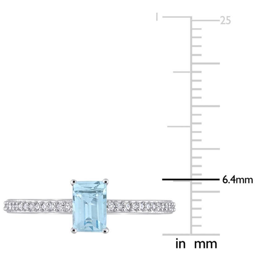 Octagonal Sky Blue Topaz and 1/10 CT TW Diamond Promise Ring in 10k White Gold
