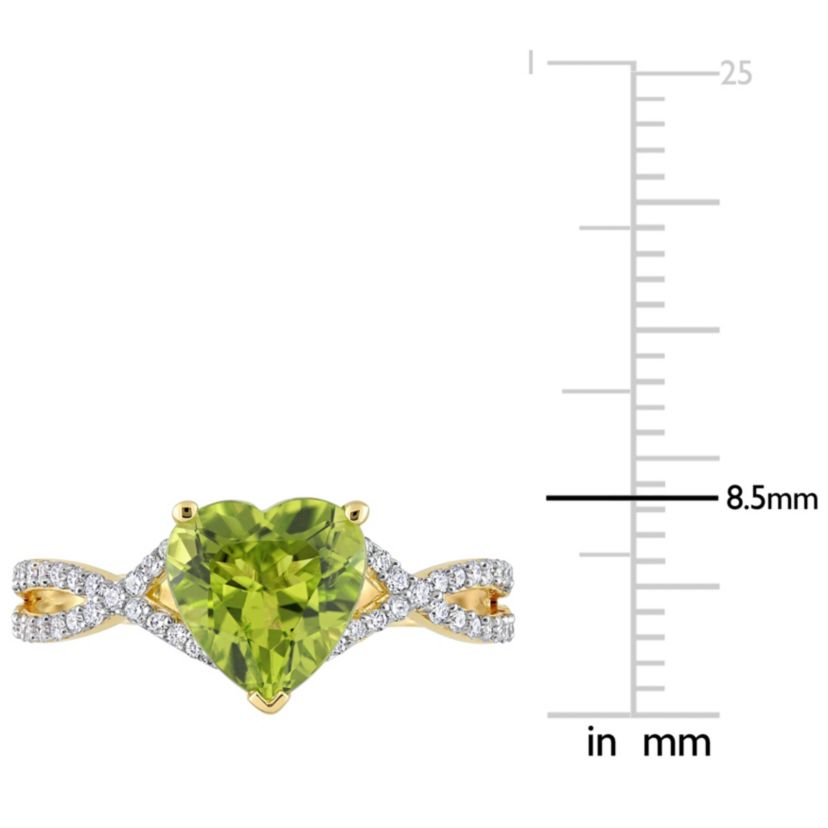 Heart Peridot and 1/5 CT TW Diamond Infinity Ring in 14k Yellow Gold