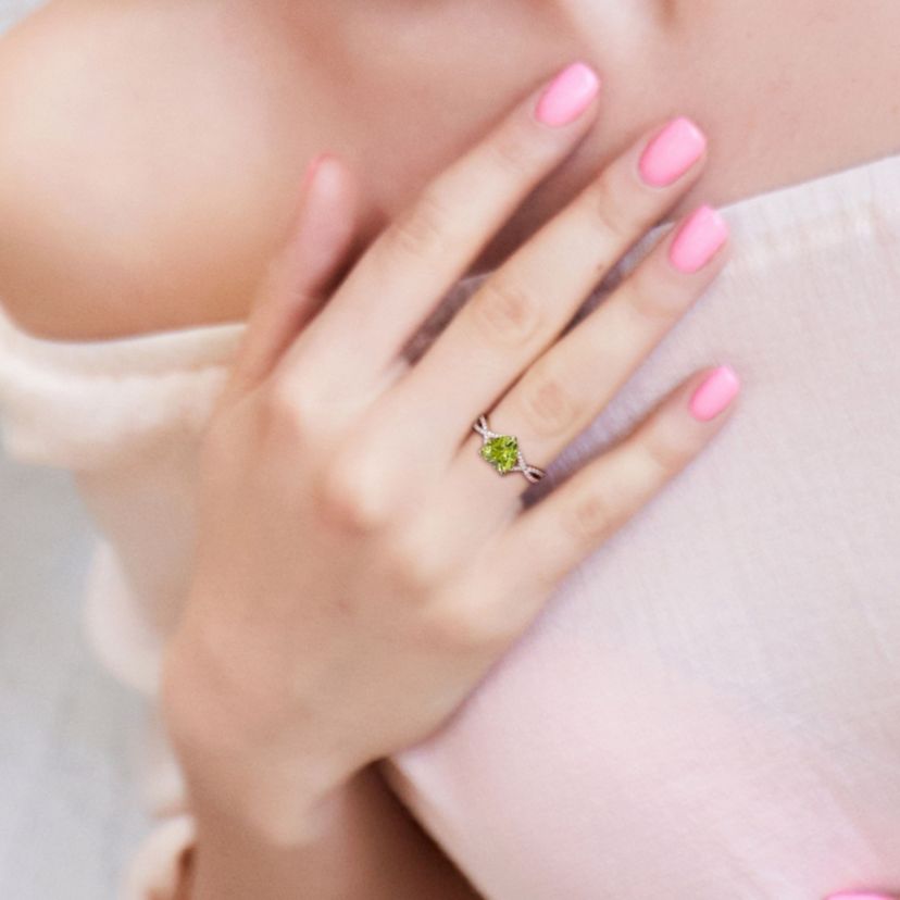 Heart Peridot and 1/5 CT TW Diamond Infinity Ring in 14k Yellow Gold