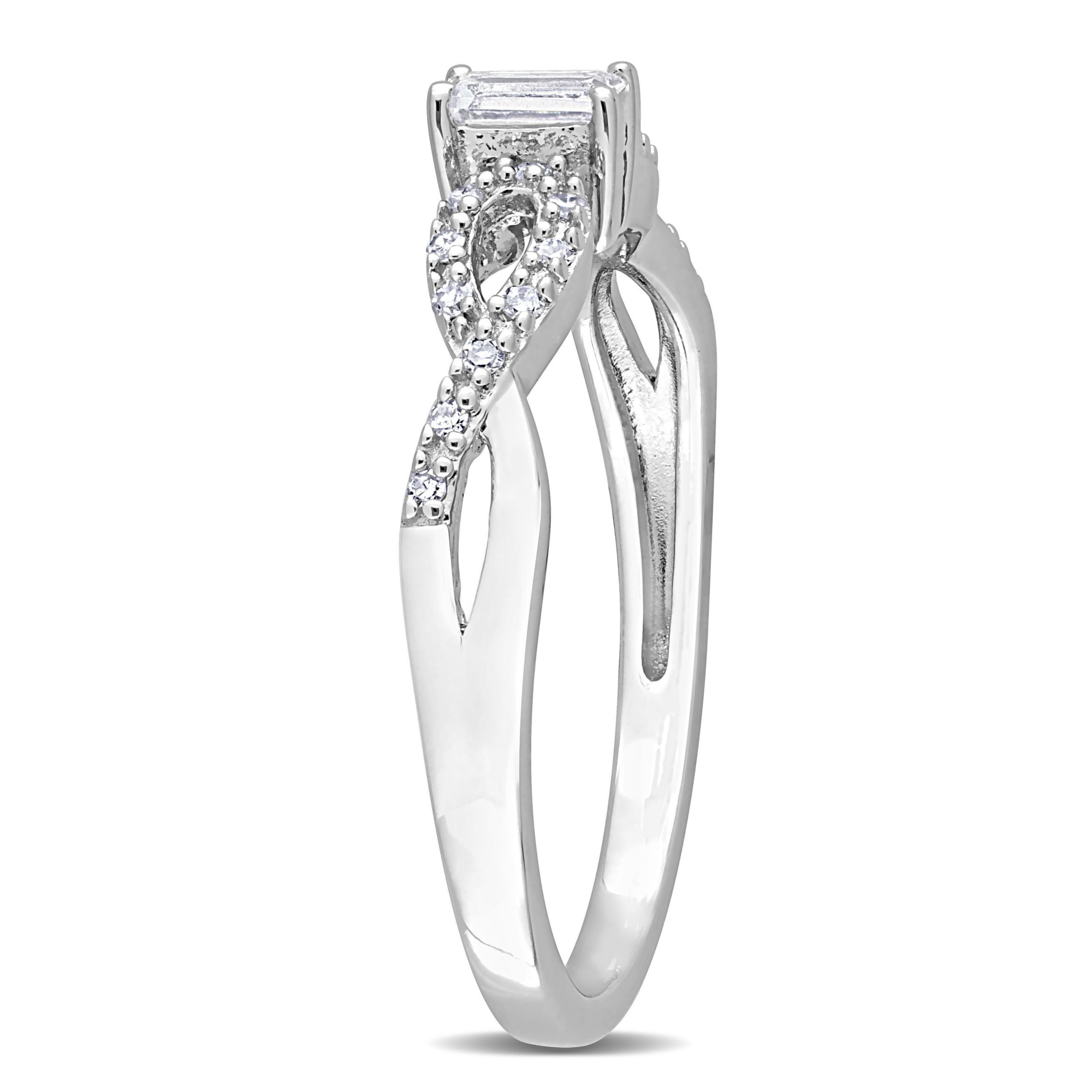 Lab Created 1/5 ct. t.g.w. Created White Sapphire and 1/10 ct. t.w. Diamond Open Infinity Ring in Sterling Silver