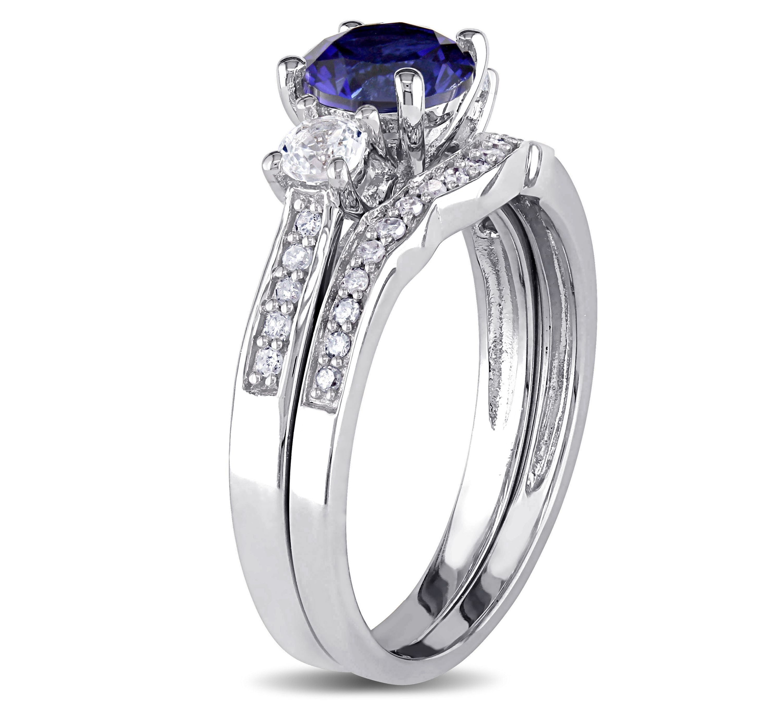 1.31 ct. t.g.w. Created Blue and White Sapphire and 1/7 ct. t.w. Diamond Bridal Ring Set in 10K White Gold