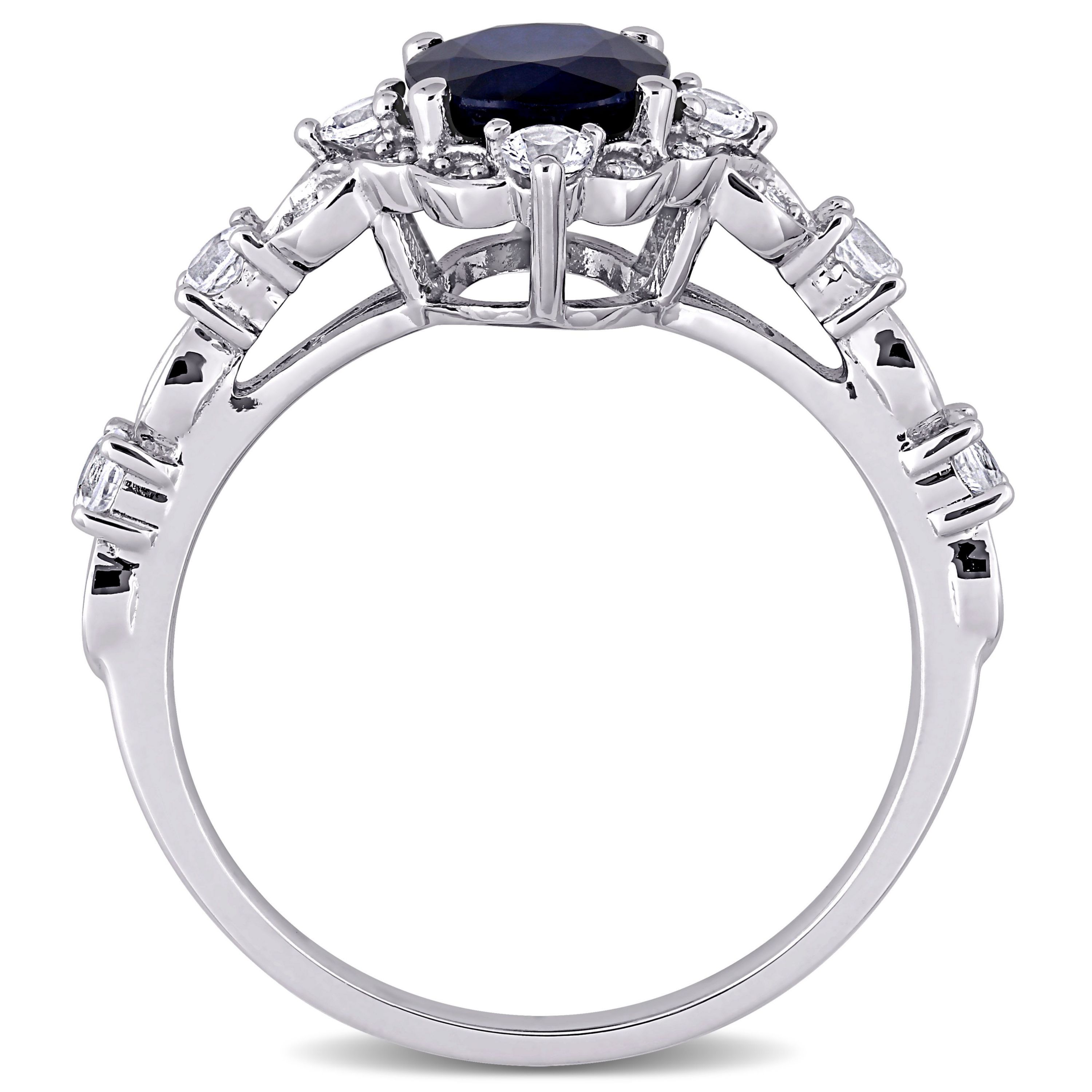 2 ct. t.g.w. Diffused Blue Sapphire, White Sapphire and 1/10 ct. t.w. Diamond Halo Cocktail Ring in 10K White Gold