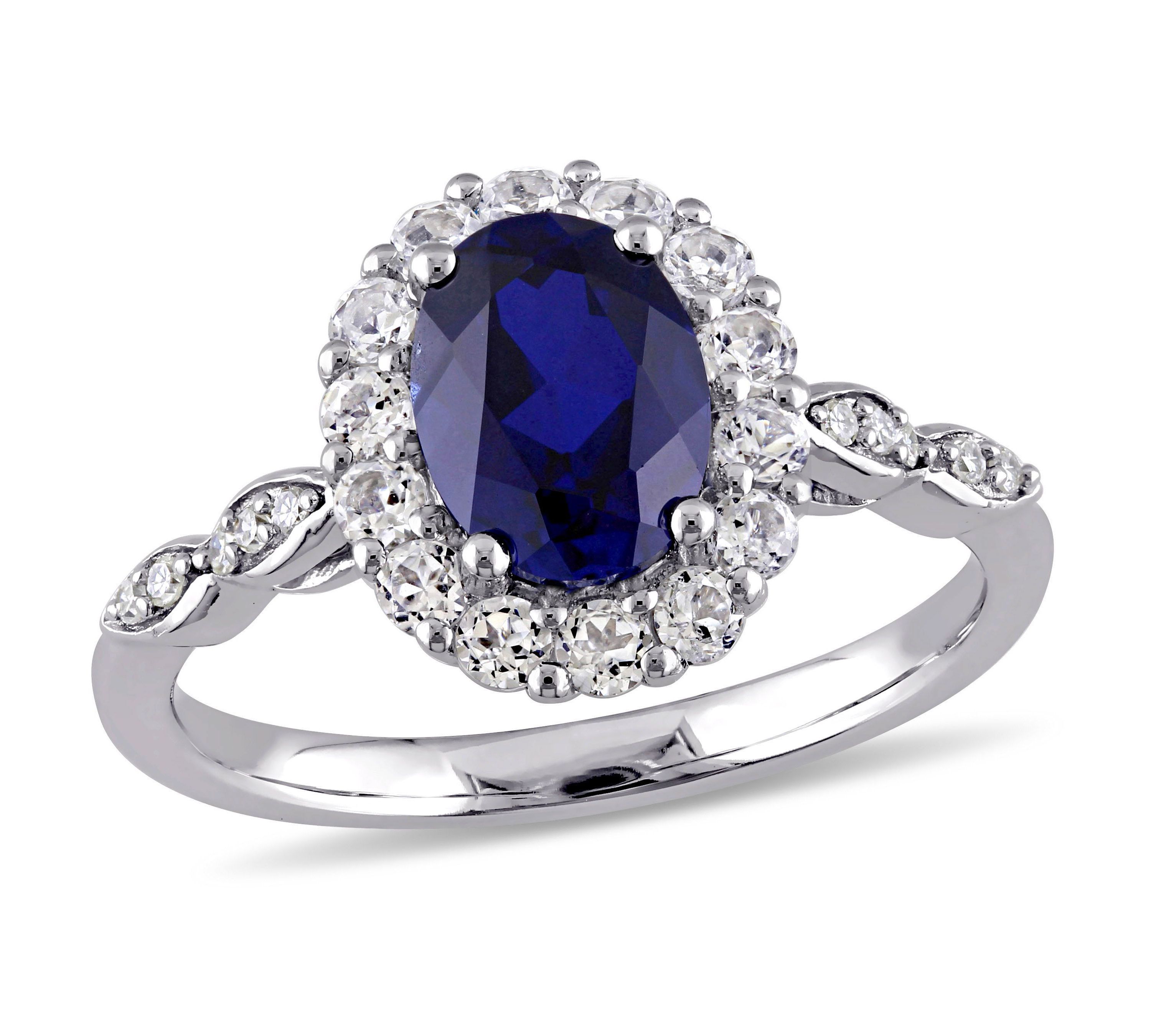 2.63 ct. t.g.w. Created Blue Sapphire, White Topaz and 1/10 ct. t.w. Diamond Halo Ring in 14K White Gold