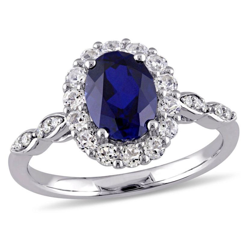 2.63 ct. t.g.w. Created Blue Sapphire, White Topaz and 1/10 ct. t.w. Diamond Halo Ring in 14K White Gold