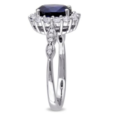 2.63 ct. t.g.w. Created Blue Sapphire, White Topaz and 1/10 t.w. Diamond Halo Ring 14K Gold