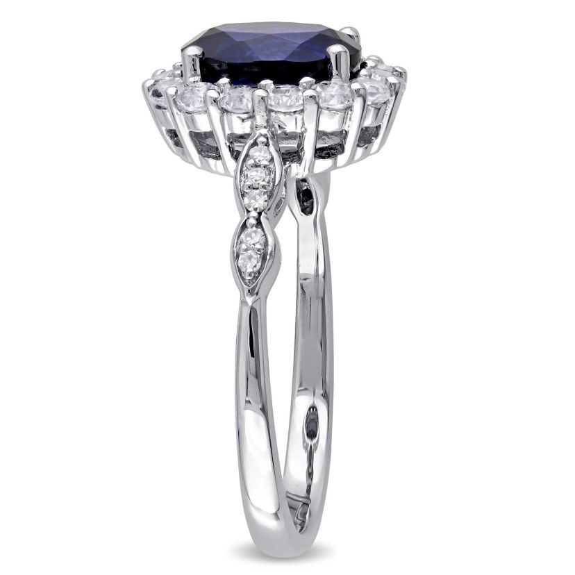 2.63 ct. t.g.w. Created Blue Sapphire, White Topaz and 1/10 ct. t.w. Diamond Halo Ring in 14K White Gold