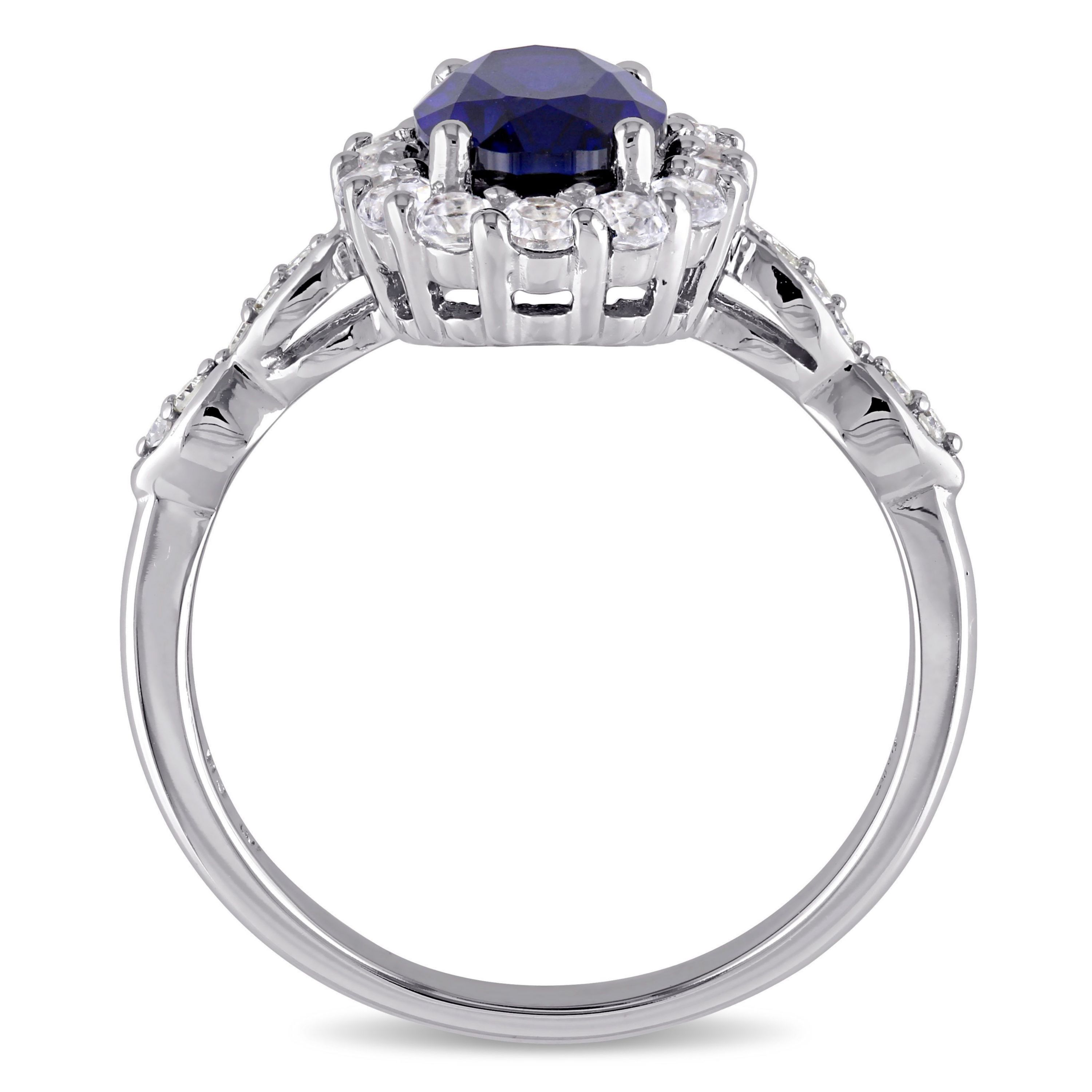 2.63 ct. t.g.w. Created Blue Sapphire, White Topaz and 1/10 ct. t.w. Diamond Halo Ring in 14K White Gold