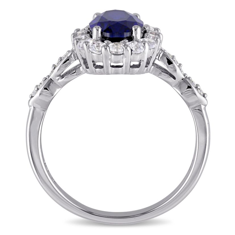 2.63 ct. t.g.w. Created Blue Sapphire, White Topaz and 1/10 ct. t.w. Diamond Halo Ring in 14K White Gold