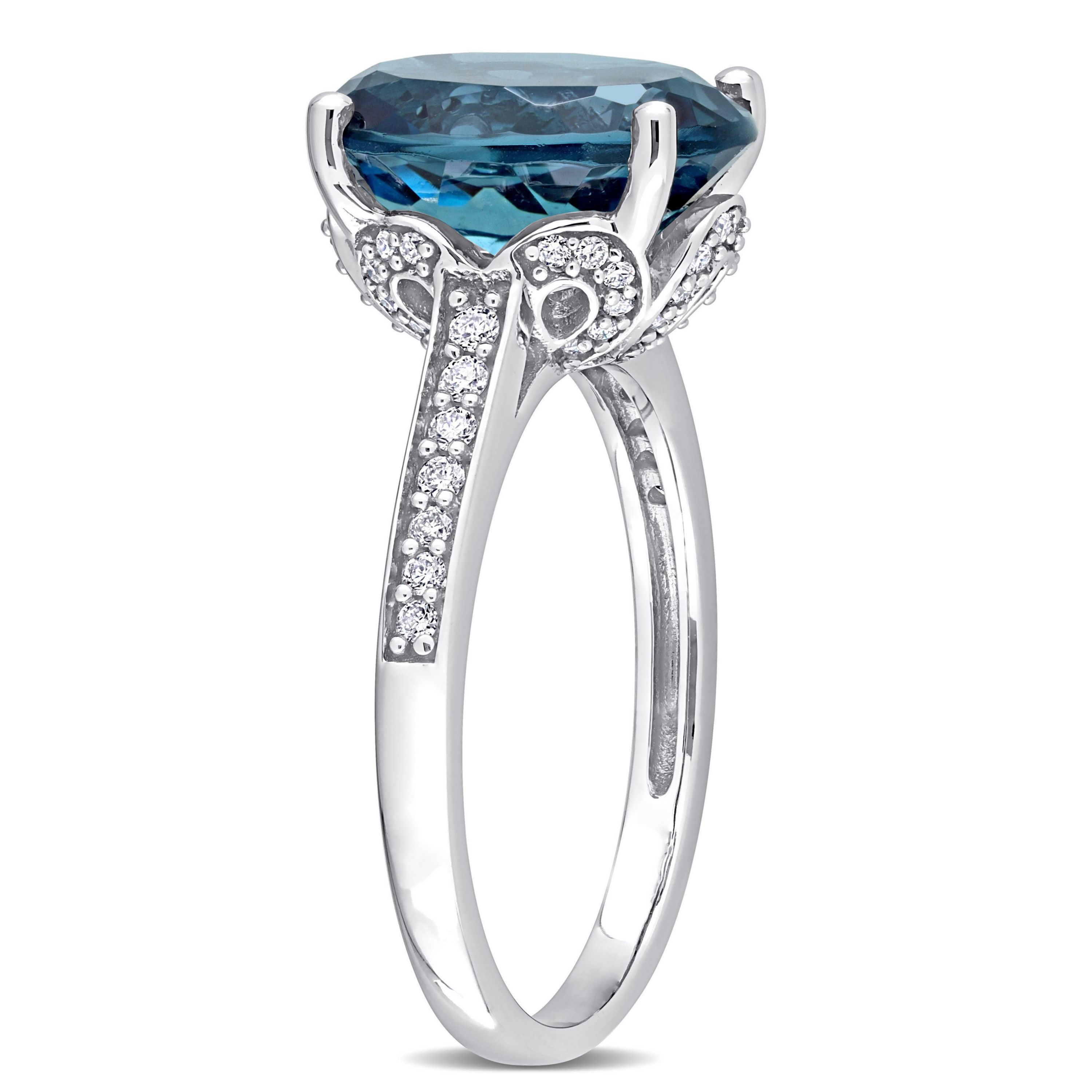 5.07 ct. t.g.w. London Blue Topaz and 1/4 ct. t.w. Diamond Cocktail Ring in 14K White Gold