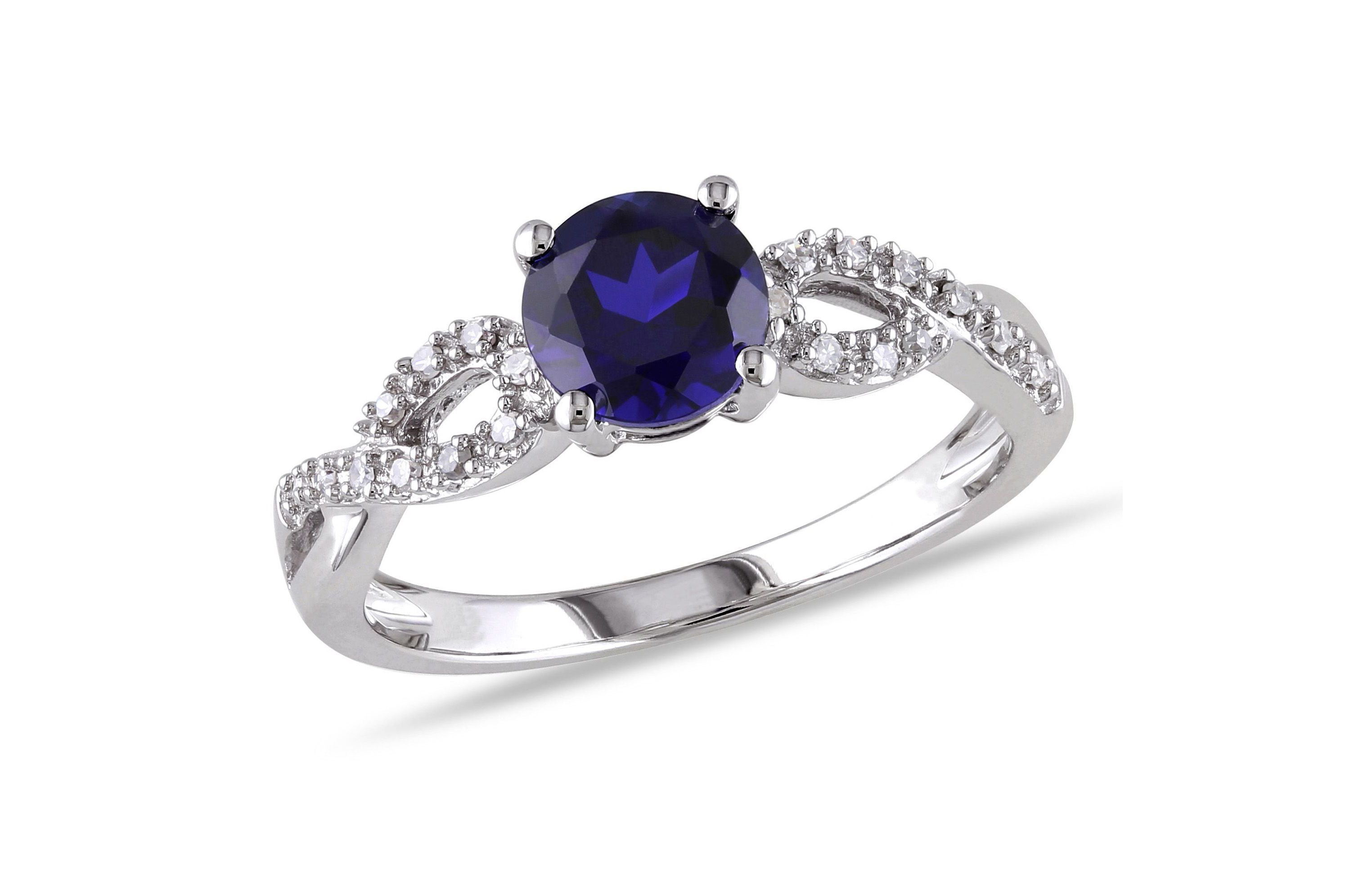 1 ct. t.g.w. Created Blue Sapphire and 1/10 ct. t.w. Diamond Infinity Ring in 10K White Gold