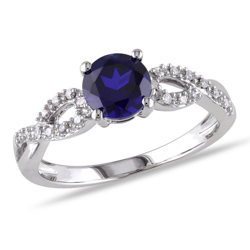 1 ct. t.g.w. Created Blue Sapphire and 1/10 ct. t.w. Diamond Infinity Ring in 10K White Gold