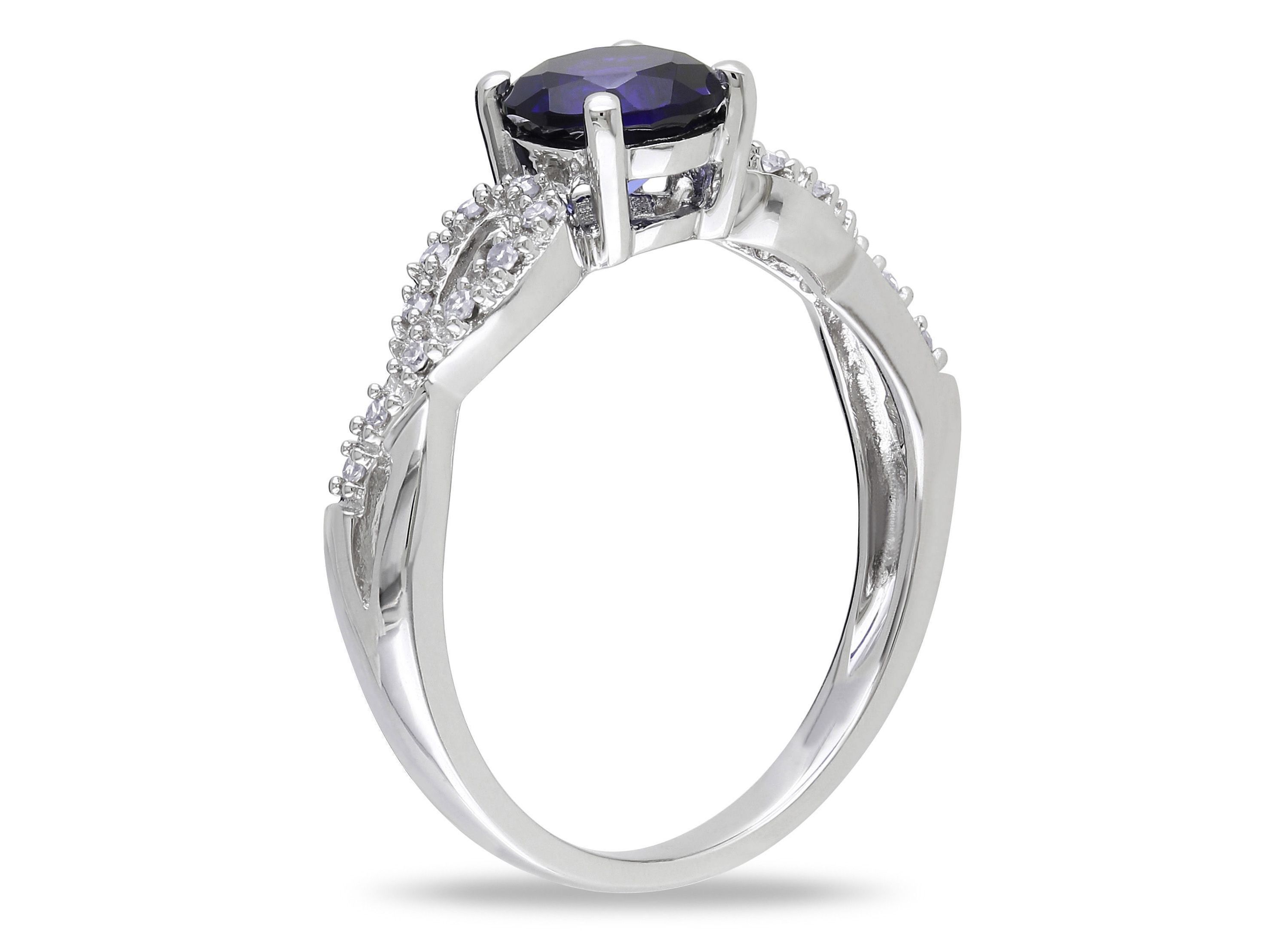 1 ct. t.g.w. Created Blue Sapphire and 1/10 ct. t.w. Diamond Infinity Ring in 10K White Gold