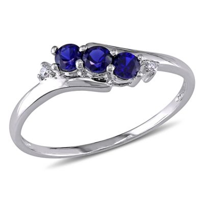 Belk & Co 2/5 Ct. T.g.w. Created Blue Sapphire And 1/10 Ct. T.w. Diamond 3-Stone Ring In 10K White Gold