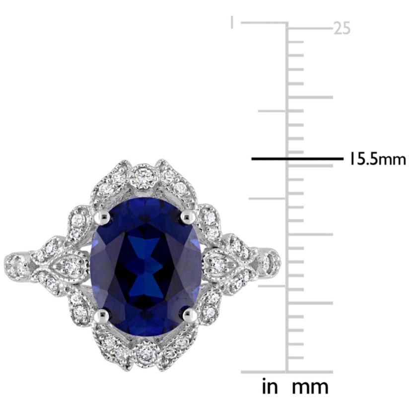 4.16 ct. t.g.w. Created Blue Sapphire and 1/5 ct. t.w. Diamond Cocktail Ring in 10K White Gold