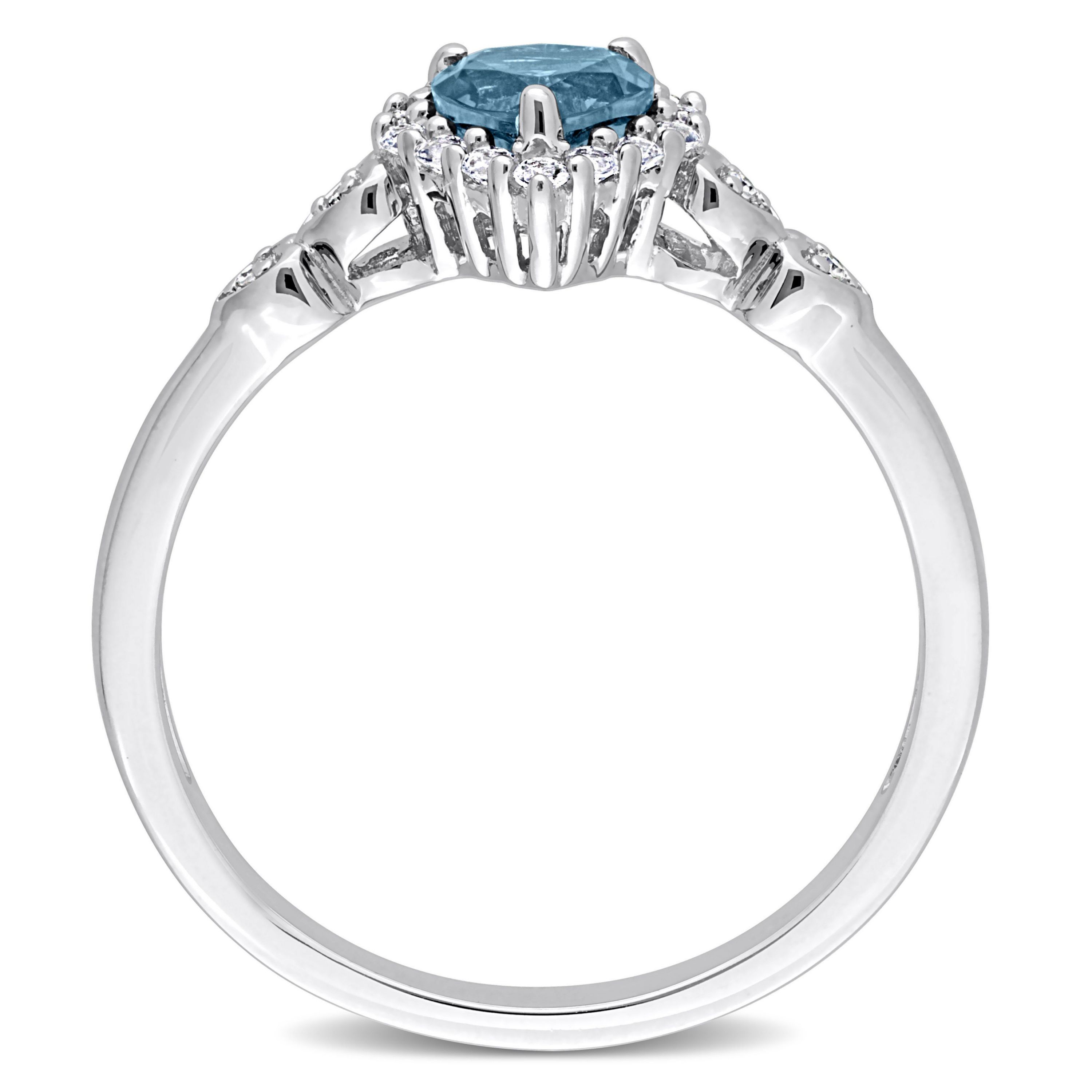 5/8 ct. t.g.w. London Blue Topaz, White Topaz and 1/10 ct. t.w. Diamond Halo Heart Ring in Sterling Silver