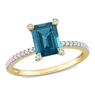 Belk & Co 2 Ct. T.g.w. London Blue Topaz And 1/10 Ct. T.w. Diamond Cocktail Ring In 14K Yellow Gold